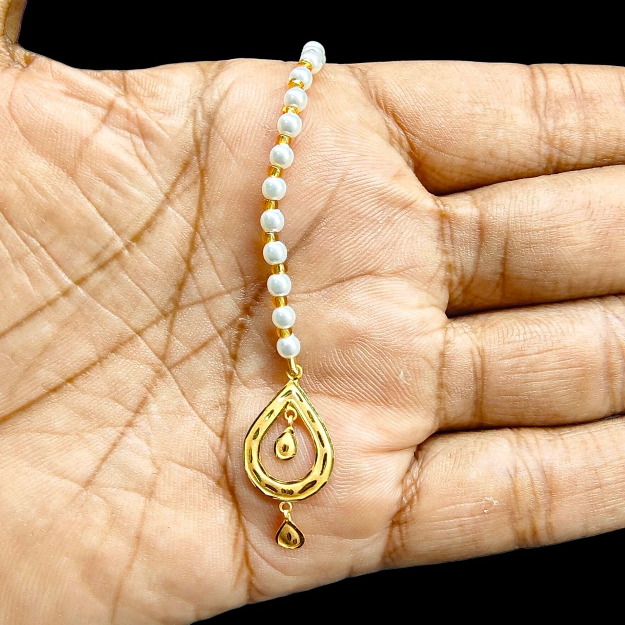 GOLD TICKLY- BIS CERTIFIED WGT: 0.400 GM APPROX HUID HALLMARK 916 22KT GOLD TICKLY (MANGTIKA) 1 PIECE FOR MARRIAGE.