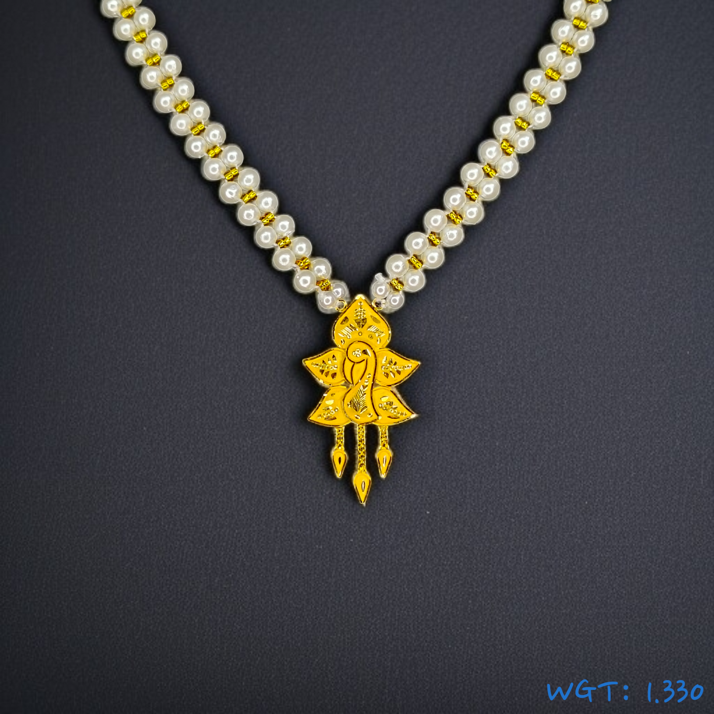 (GPM) TRJ WGT: 1.330 GM APPROX HUID HALLMARK 22KT GOLD MOTI PENDANT 1 PIECE.