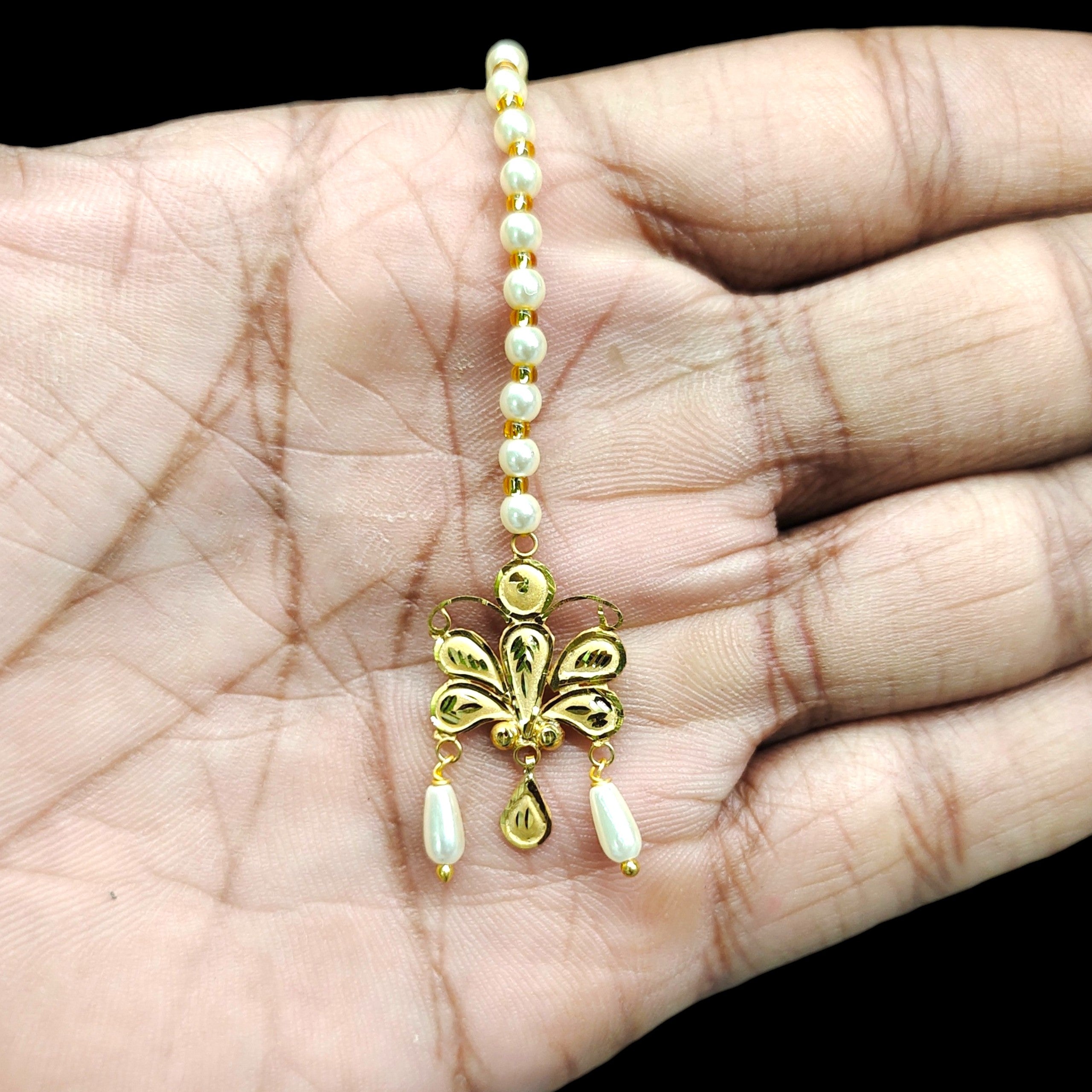 GOLD TICKLY- (WGT: 0.530 GM APPROX) CERTIFIED BIS HUID HALLMARK 375 9KT GOLD TICKLY (MANGTIKA) 1 PIECE FOR MARRIAGE.