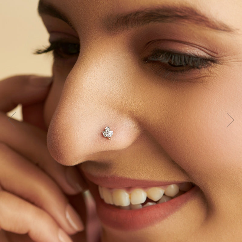 NOSEPIN- RAJLAXMI DIAMOND JEWELLERY - WGT: 0.185 GM - NATURAL DIAMOND (0.06 CENT) HUID HALLMARK 18KT DIAMOND NOSEPIN FOR WOMEN WITH CERTIFICATE OF AUTHENTICITY BY IGJI (DESIGN NO: M12082537).
