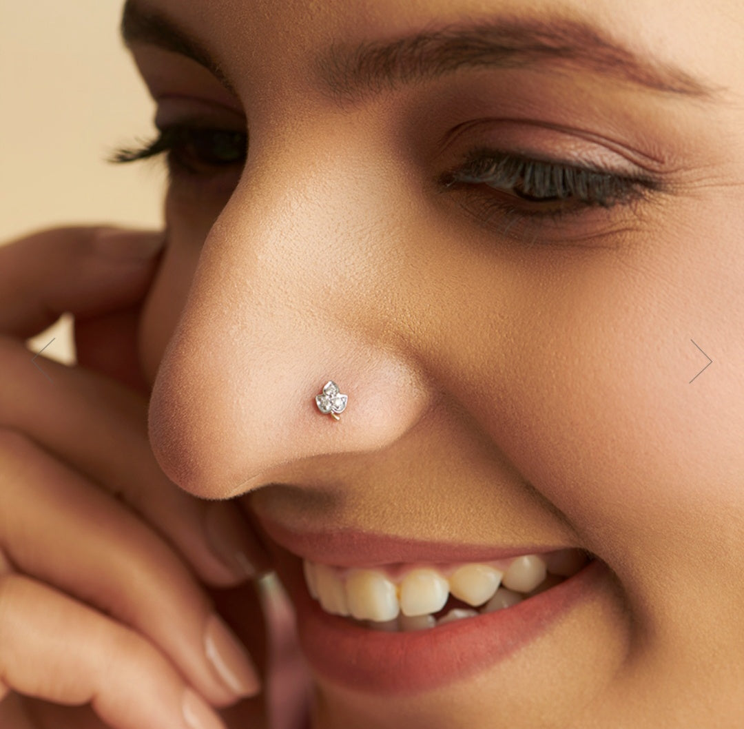 NOSEPIN- RAJLAXMI DIAMOND JEWELLERY - WGT: 0.185 GM - NATURAL DIAMOND (0.06 CENT) HUID HALLMARK 18KT DIAMOND NOSEPIN FOR WOMEN WITH CERTIFICATE OF AUTHENTICITY BY IGJI (DESIGN NO: M12082537).