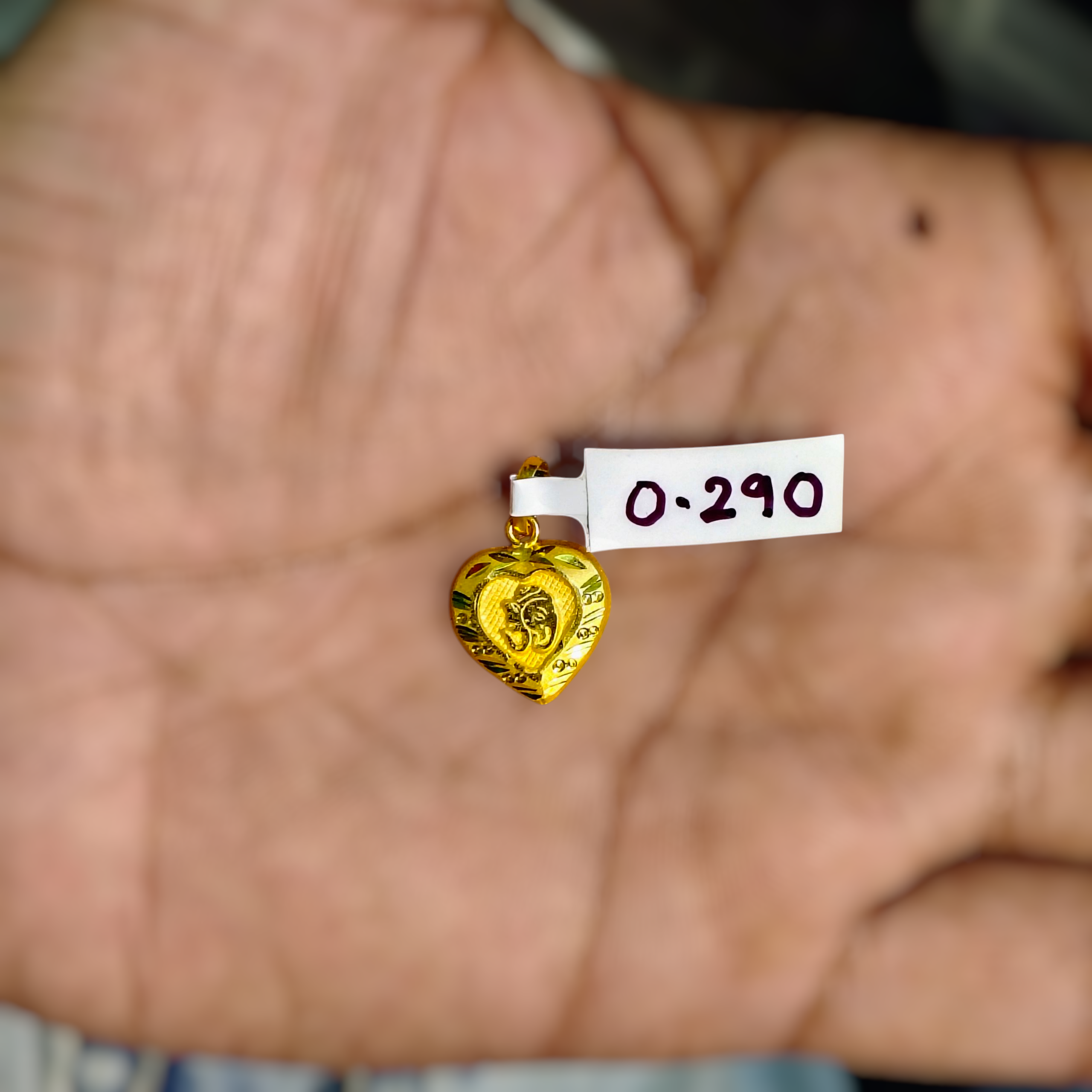 (GLKD) LOCKET WGT: 0.290 GM APPROX KDM GOLD LOCKET 1 PIECE (50 TONCH) WITH ADJUSTABLE TASSEL FOR GIFTING PURPOSE (CHAIN NOT INCLUDED).