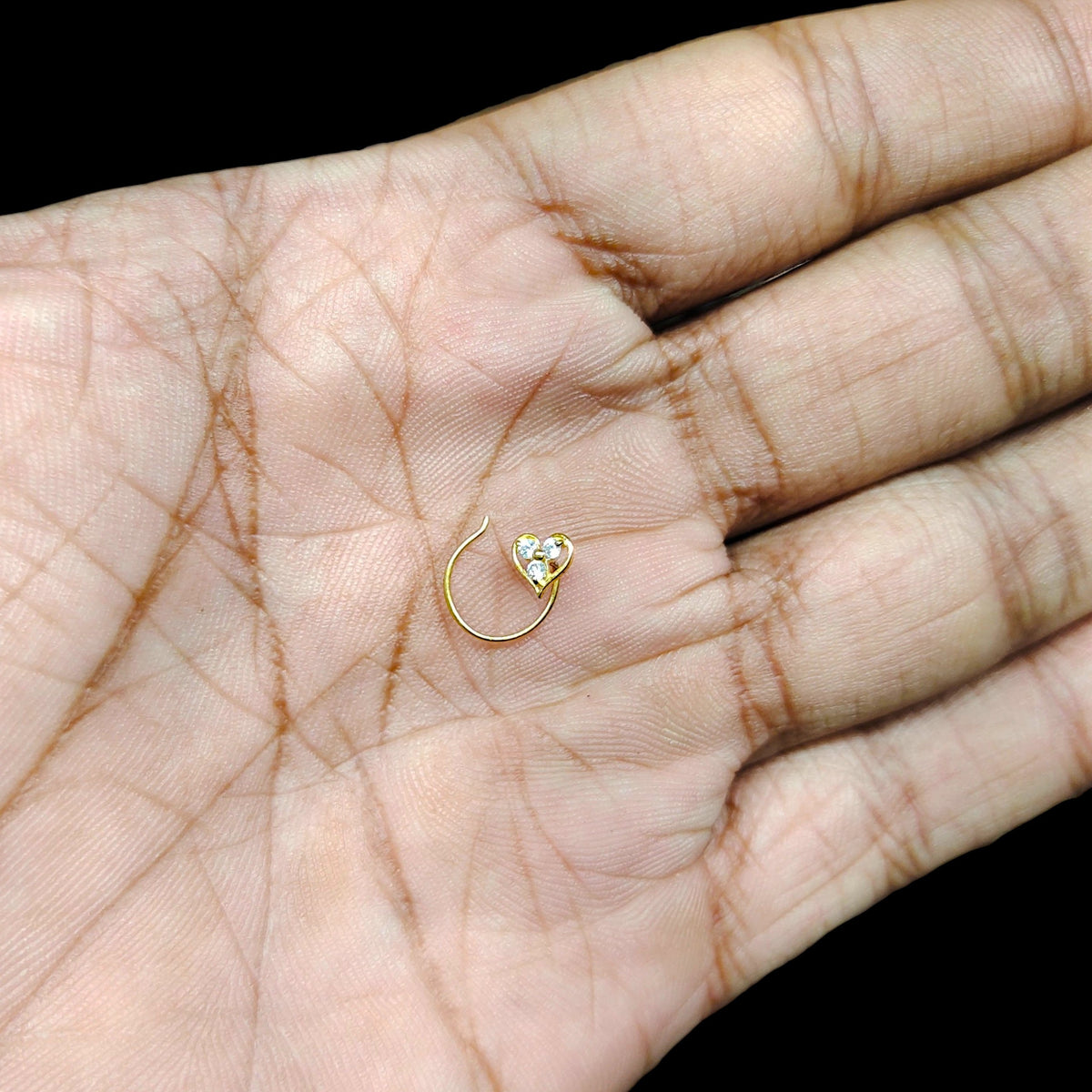 GOLD NOSEPIN- (WGT: 0.180 GM APPROX) BIS CERTIFIED HUID HALLMARK 375 9KT GOLD NOSEPIN 1 PIECE FOR WOMEN (FOR REGULAR USE). SOLD ON MRP.