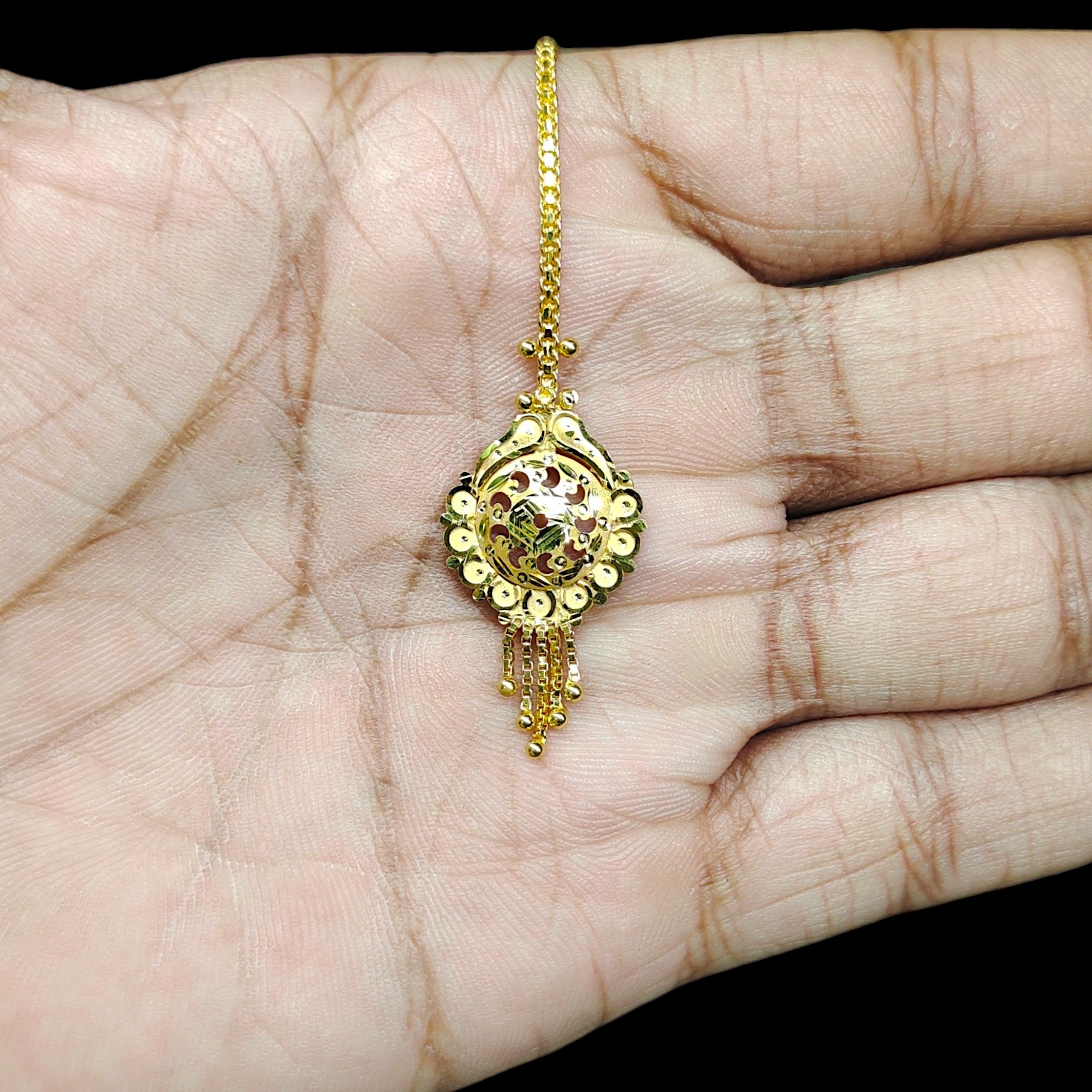 GOLD TICKLY- (WGT: 1.870 GM APPROX) CERTIFIED BIS HUID HALLMARK 375 9KT GOLD TICKLY (MANGTIKA) 1 PIECE FOR MARRIAGE.