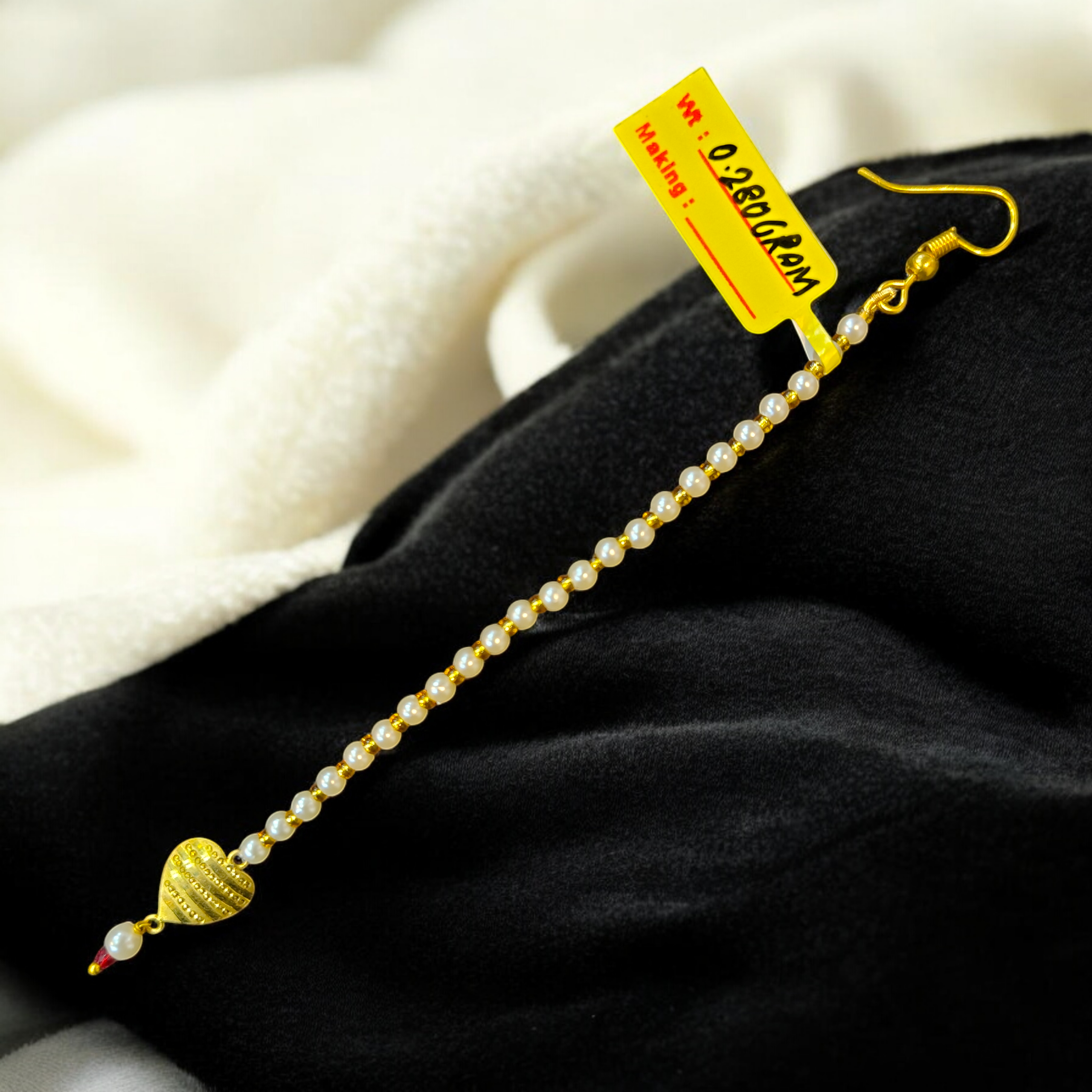 (GTMT) TRJ WGT: 0.280 GM APPROX 18KT HUID HALLMARK GOLD TICKLY (MANGTIKA) 1 PIECE FOR MARRIAGE.