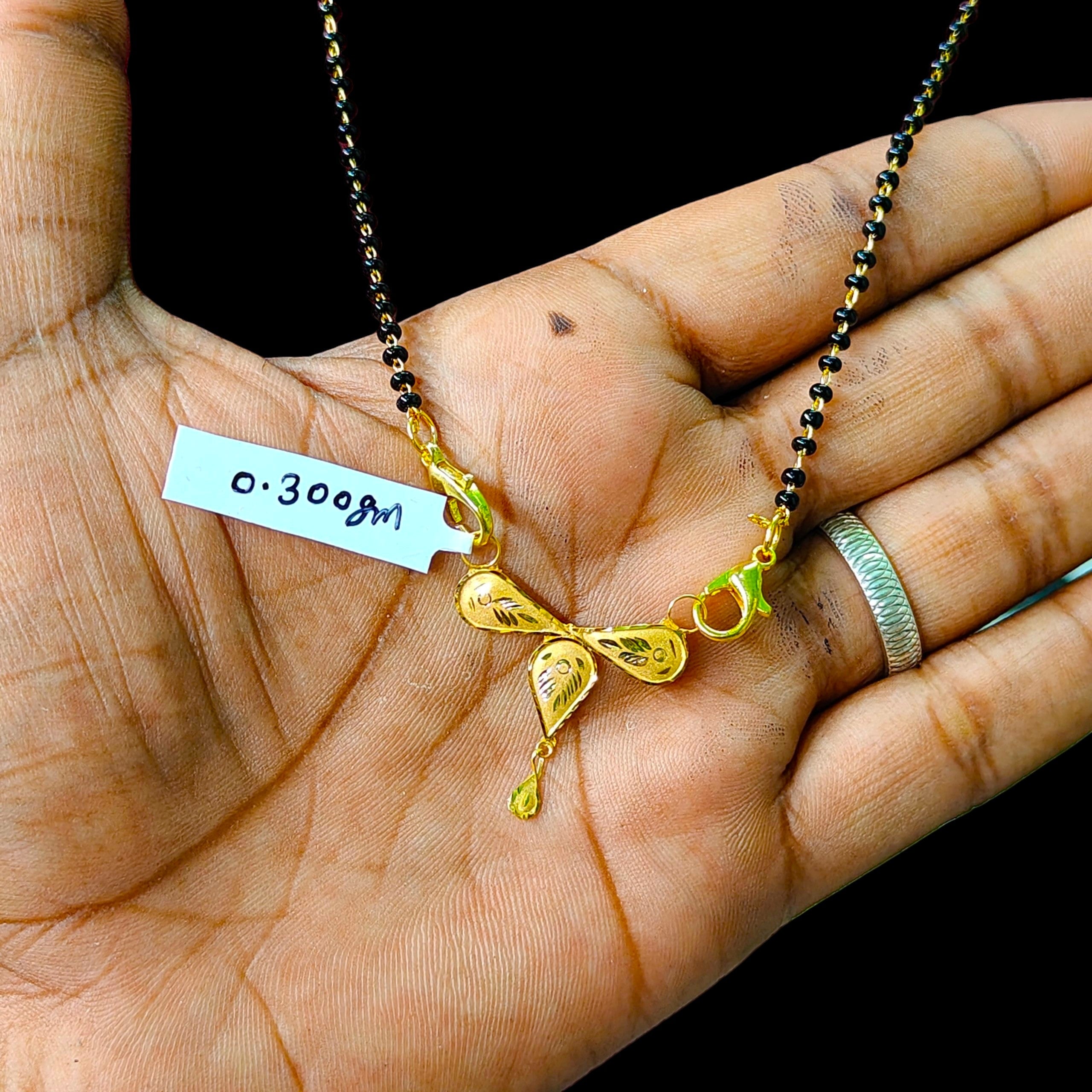 GOLD PENDANT- (WGT: 0.300 GM APPROX) BIS CERTIFIED HUID HALLMARK 375 9KT GOLD PENDANT FOR WOMEN 1 PIECE WITH FREE MANGALSUTRA & TASSEL.