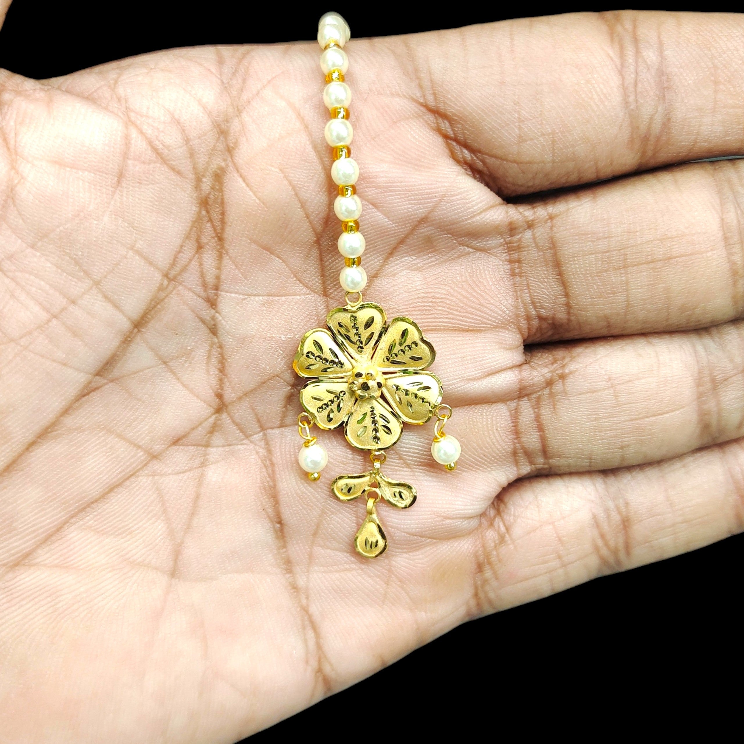 GOLD TICKLY- (WGT: 0.930 GM APPROX) CERTIFIED BIS HUID HALLMARK 375 9KT GOLD TICKLY (MANGTIKA) 1 PIECE FOR MARRIAGE.