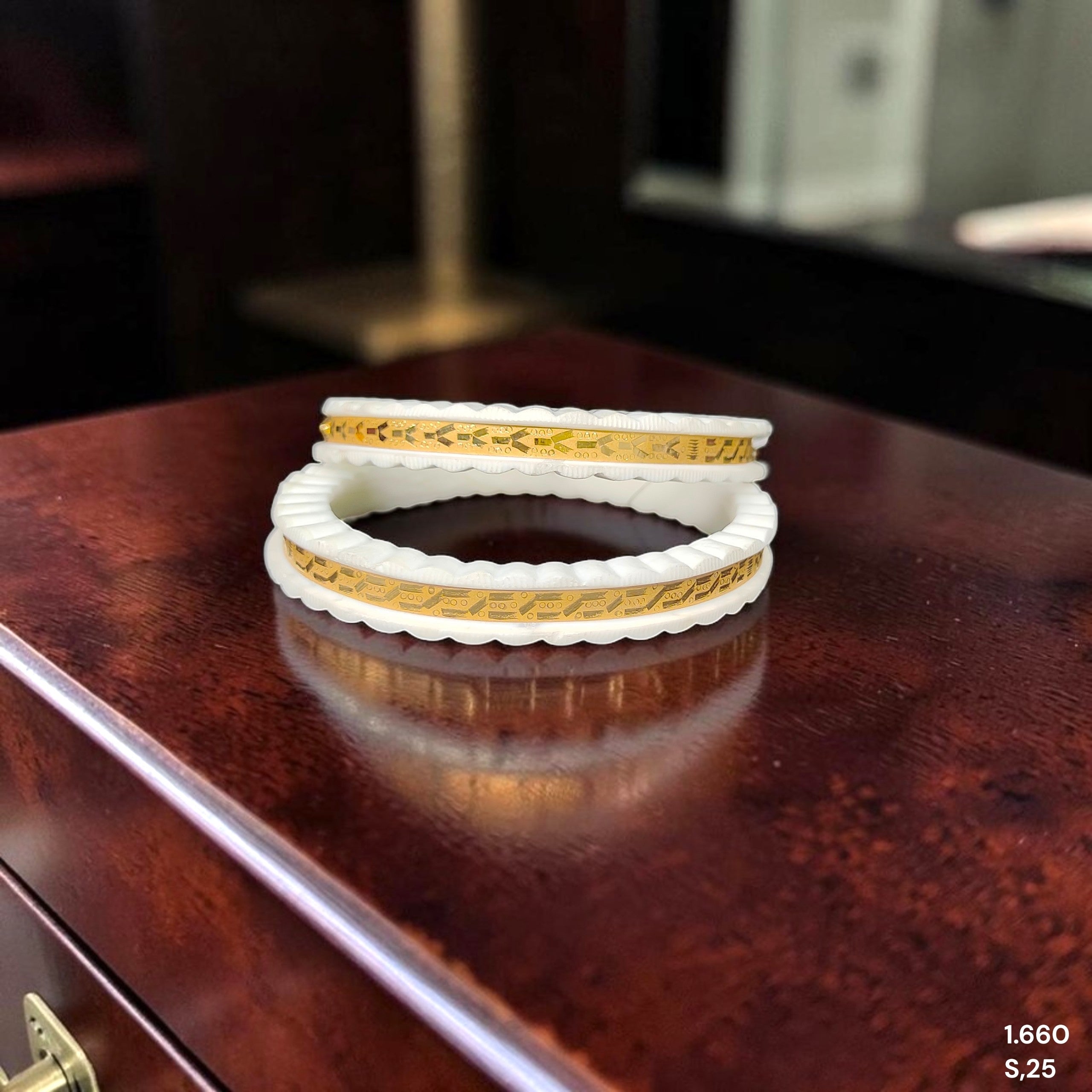 SAKHA BADHANO- (SIZE:25) WGT: 1.660 GM APPROX HUID HALLMARK 22KT GOLD SAKHA BADHANO BANGLES 1 PAIR DESIGN FOR REGULAR USE.