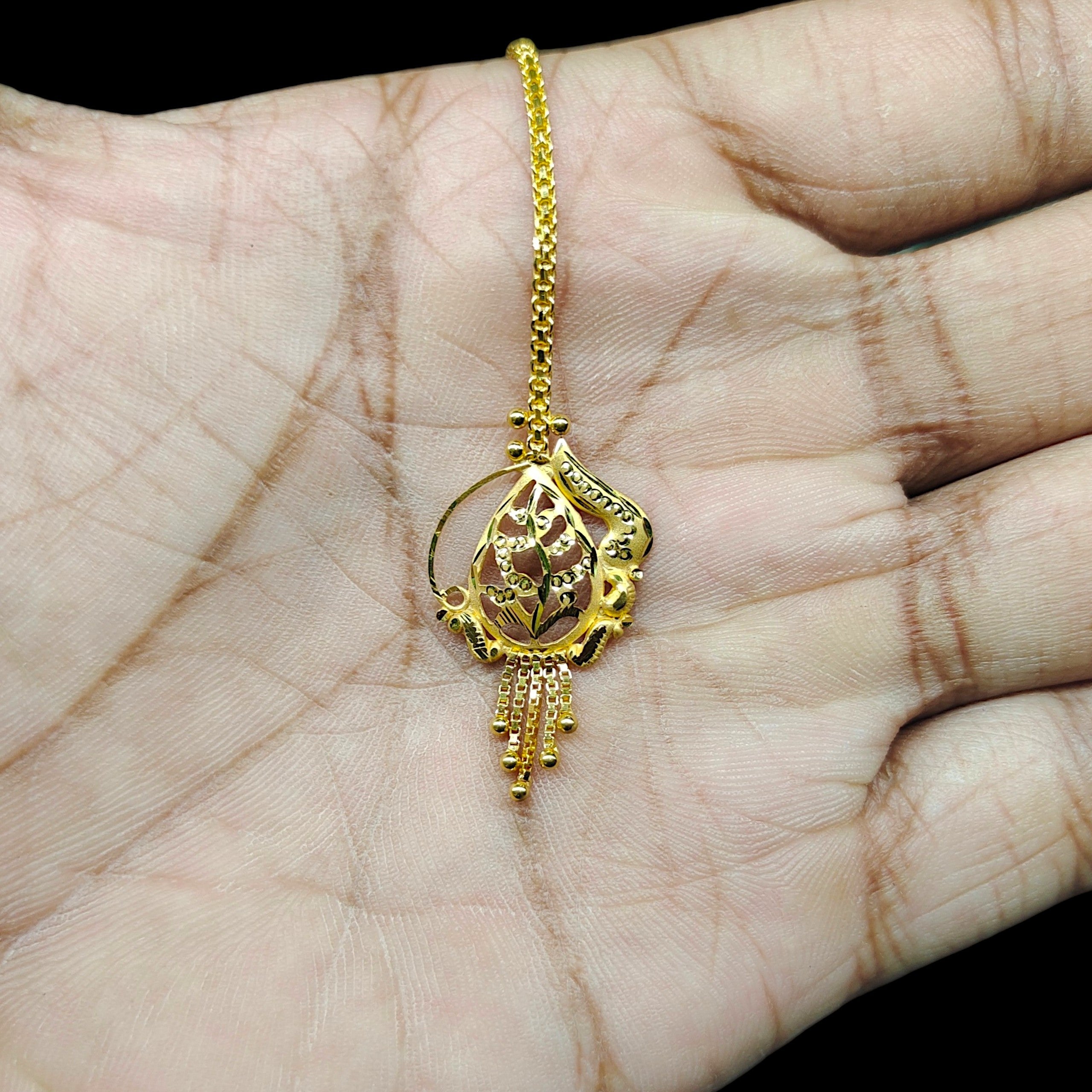 GOLD TICKLY- (WGT: 1.670 GM APPROX) CERTIFIED BIS HUID HALLMARK 375 9KT GOLD TICKLY (MANGTIKA) 1 PIECE FOR MARRIAGE.