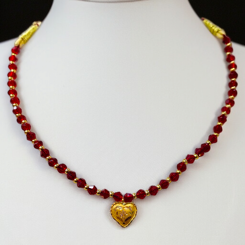 TRJ WGT: 0.150 GM APPROX KDM GOLD LOVE DESIGN LOCKET 1 PIECE WITH RED CRYSTAL ADJUSTABLE TASSEL FOR GIFT PURPOSE (50 TONCH).