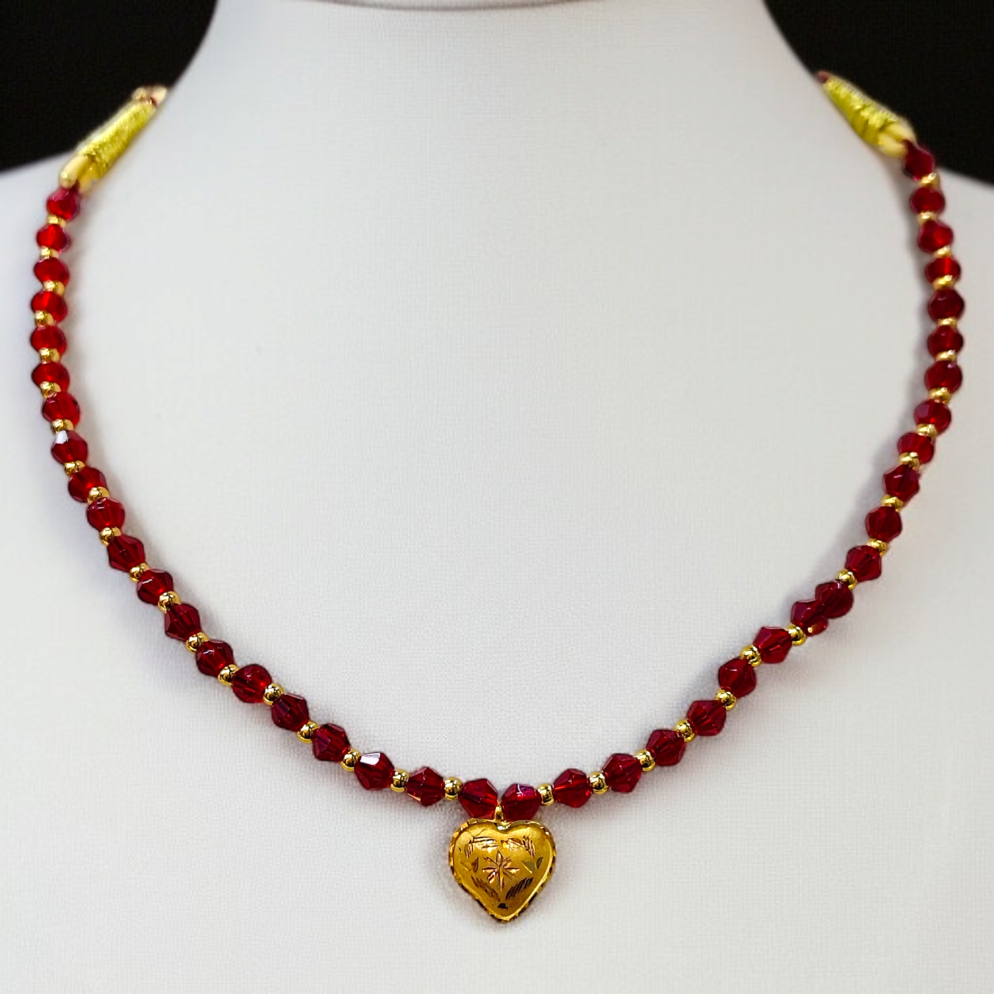 (GML) TRJ WGT: 0.150 GM APPROX KDM GOLD LOVE DESIGN LOCKET 1 PIECE WITH RED CRYSTAL ADJUSTABLE TASSEL FOR GIFT PURPOSE (50 TONCH).