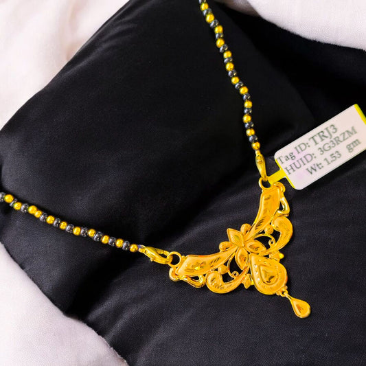 TRJ WGT: 1.530 GM APPROX 22KT HUID HALLMARK GOLD PENDANT MANGALSUTRA 1 PIECE WITH TASSEL.