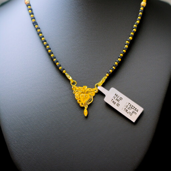 TRJ WGT: 0.870 GM APPROX 22KT HUID HALLMARK GOLD PENDANT MANGALSUTRA 1 PIECE WITH TASSEL.