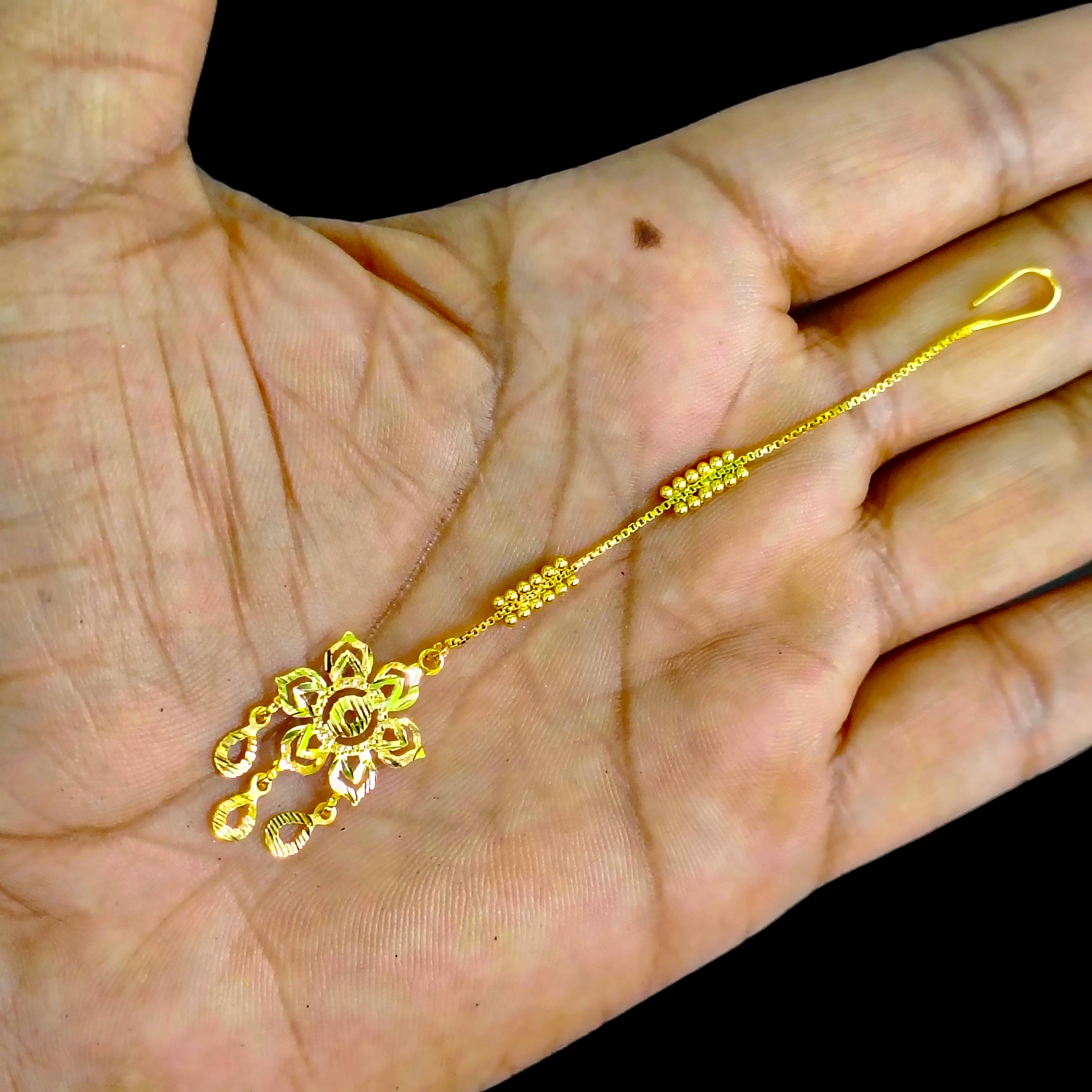GOLD TICKLY- BIS CERTIFIED WGT: 1.070 GM APPROX HUID HALLMARK 375 9KT GOLD TICKLY (MANGTIKA) 1 PIECE FOR MARRIAGE.