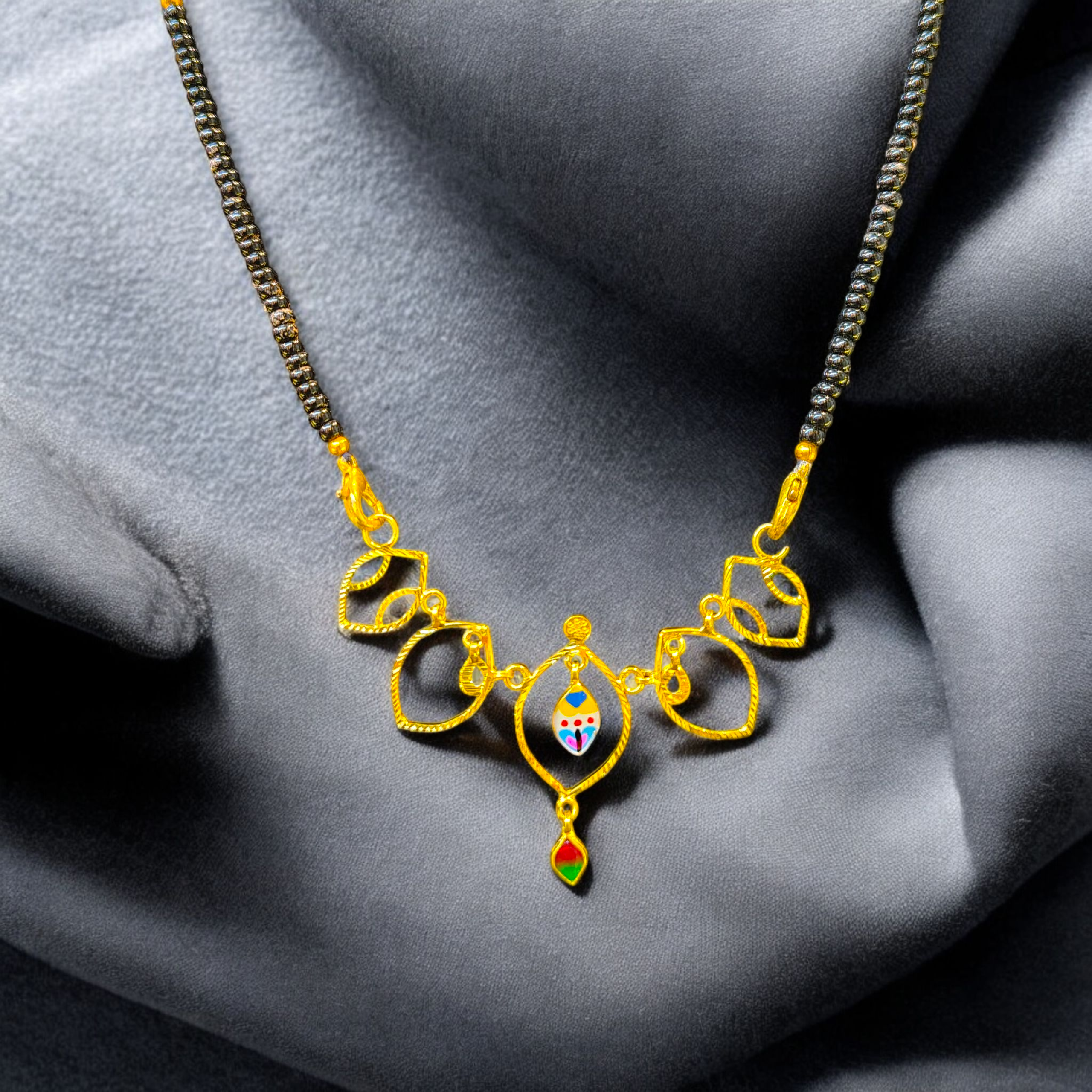 (GPM) TRJ WGT: 2.00 GM APPROX 22KT HUID HALLMARK GOLD PENDANT 1 PIECE WITH ADJUSTABLE TASSEL.