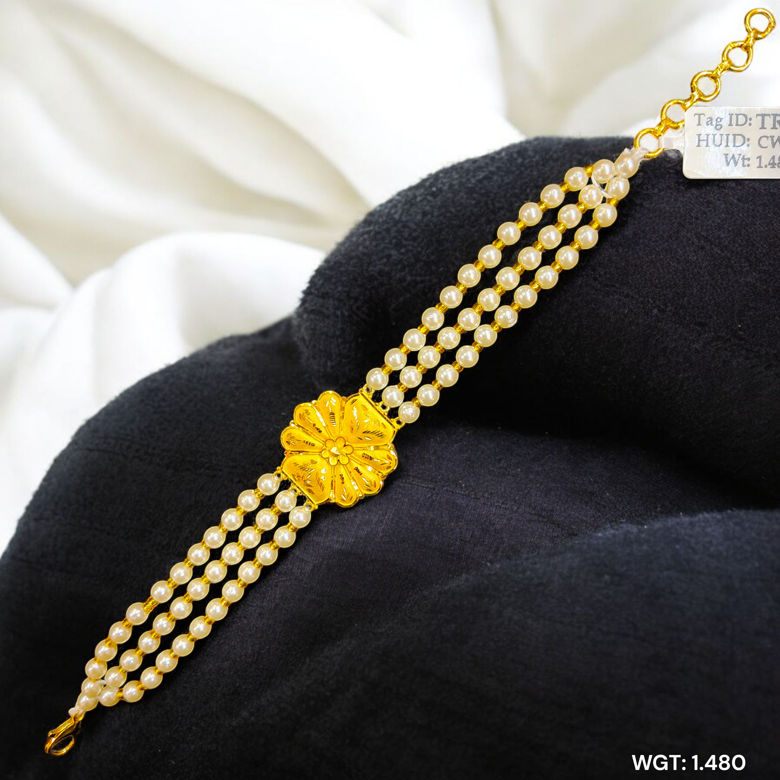 (GMW) RAJLAXMI WGT: 1.480 GM APPROX HUID HALLMARK 916 22KT GOLD MANTASHA WITH PEARL CHAIN FOR WOMEN.