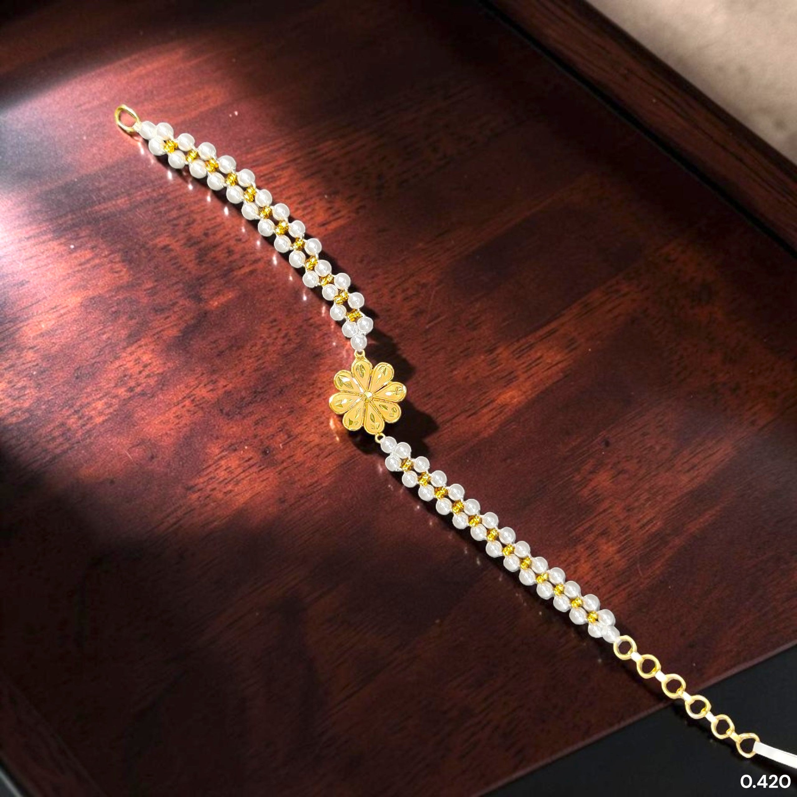 GOLD WRISTLET- (WGT: 0.420 GM APPROX) BIS CERTIFIED HUID HALLMARK 375 9KT GOLD WRISTLET (BRACELET) WITH MOTI CHAIN FOR WOMEN (ADJUSTABLE SIZE).