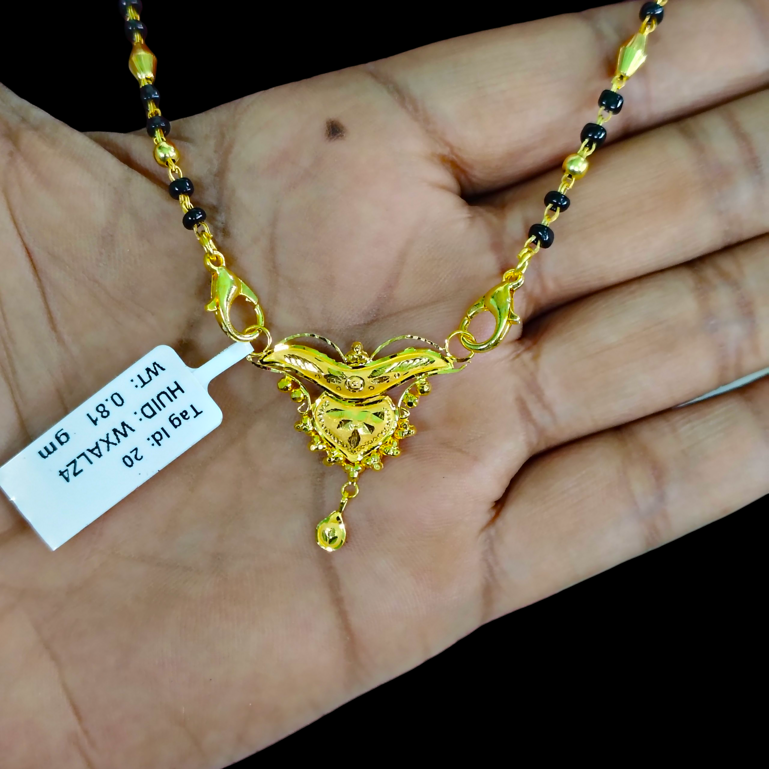 GOLD PENDANT- WGT: 0.810 GM APPROX 22KT HUID HALLMARK GOLD PENDANT MANGALSUTRA 1 PIECE WITH TASSEL.