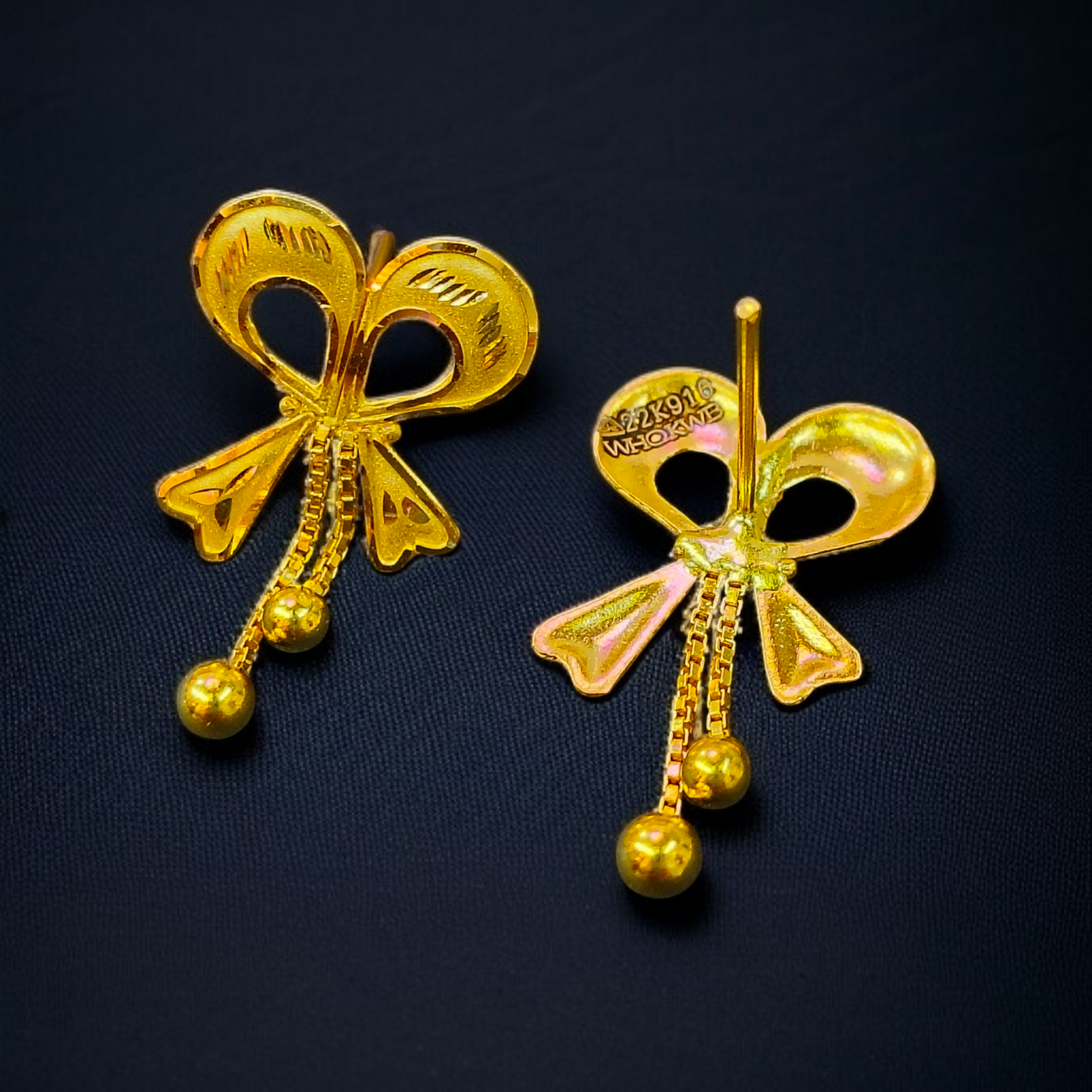 RAJLAXMI D- HWVG9P/QQJ6WP WGT: 1.650 GM APPROX HUID HALLMARK 916 22KT GOLD EAR TOPS STUD 1 PAIR FOR REGULAR USE.