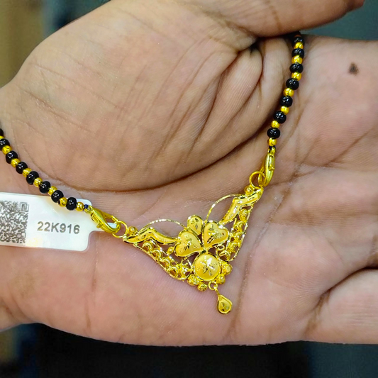 TRJ WGT: 1.260 GM APPROX 22KT HUID HALLMARK GOLD PENDANT MANGALSUTRA 1 PIECE WITH TASSEL.