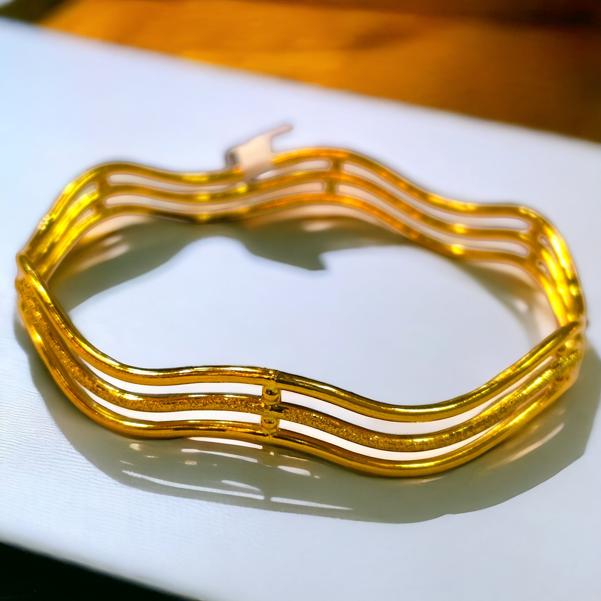 TRJ MTO (GCB) DUPLEX WAVE DESIGN HALLMARK 22KT GOLD COVER BANGLE 1 PIECE APPROX WGT: 2.100 GM FOR WOMEN - (BILL MANDATORY -EXCHANGE FOR LIFETIME IN STORE ONLY).