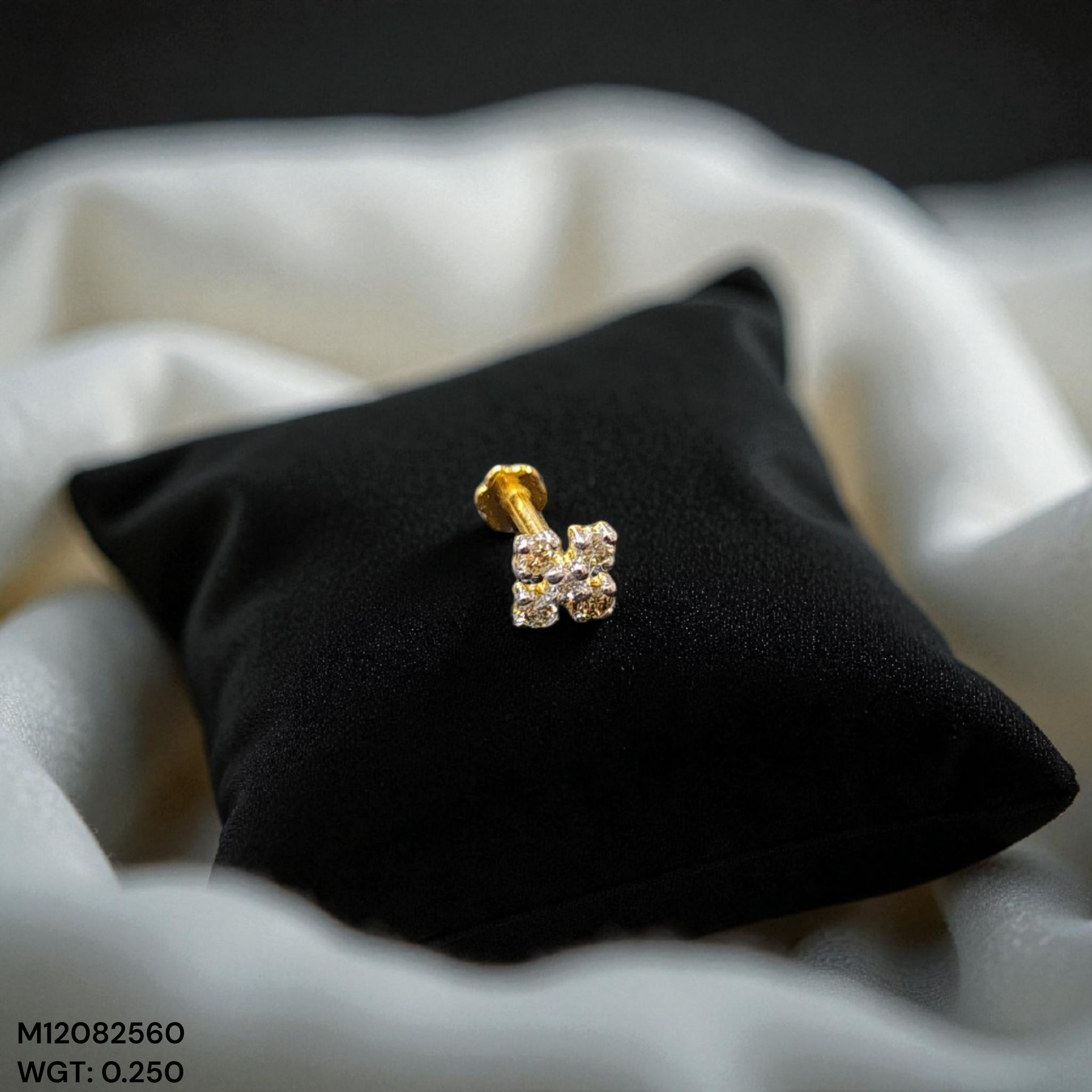 (GNP) RAJLAXMI DIAMOND JEWELLERY - WGT: 0.250 GM - NATURAL DIAMOND (0.08 CENT) HUID HALLMARK 18KT DIAMOND NOSEPIN FOR WOMEN WITH CERTIFICATE OF AUTHENTICITY BY IGJI (DESIGN NO: M12082560).