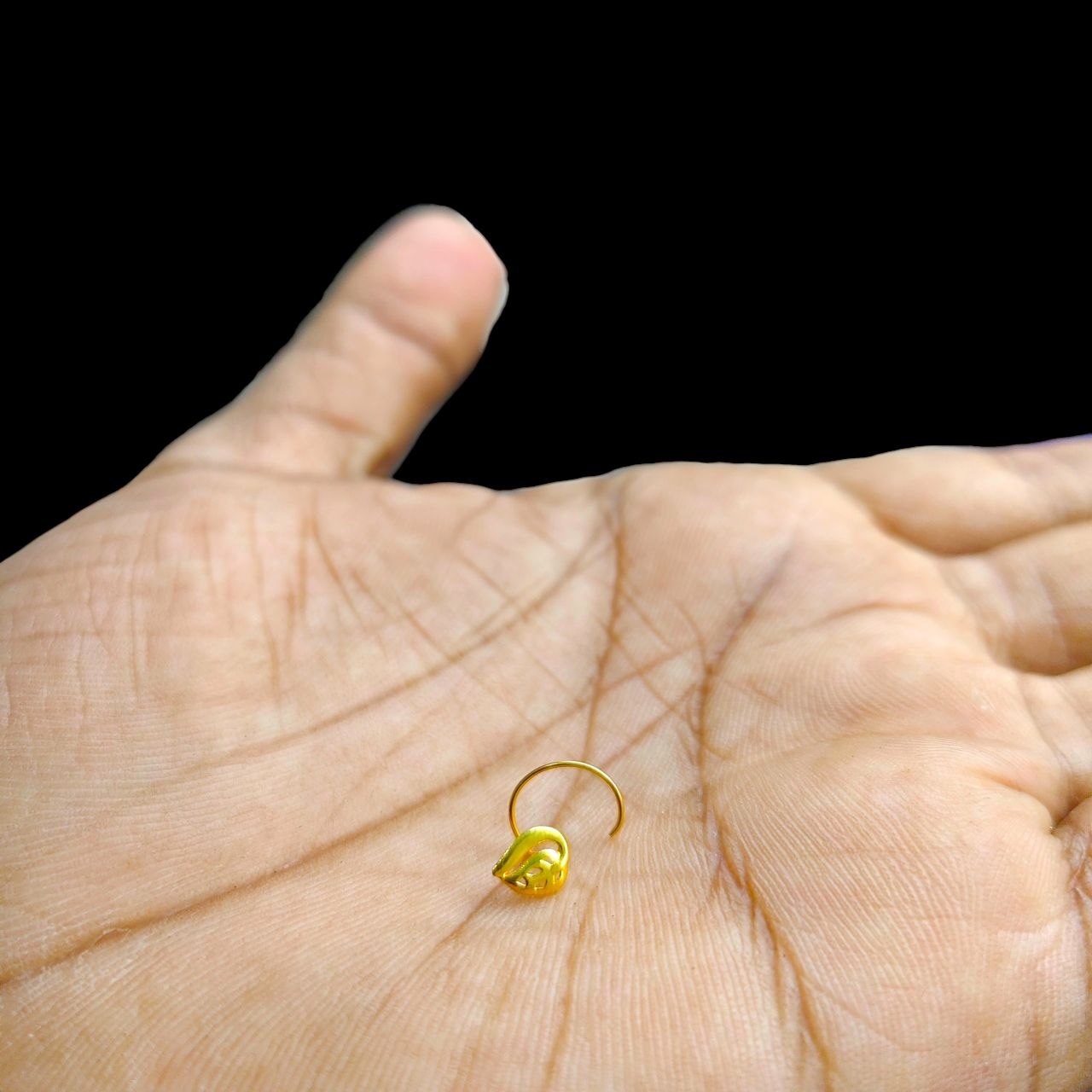 GOLD NOSEPIN- BIS CERTIFIED HUID HALLMARK 375 9KT GOLD NOSEPIN 1 PIECE FOR WOMEN (FOR REGULAR USE). SOLD ON MRP.