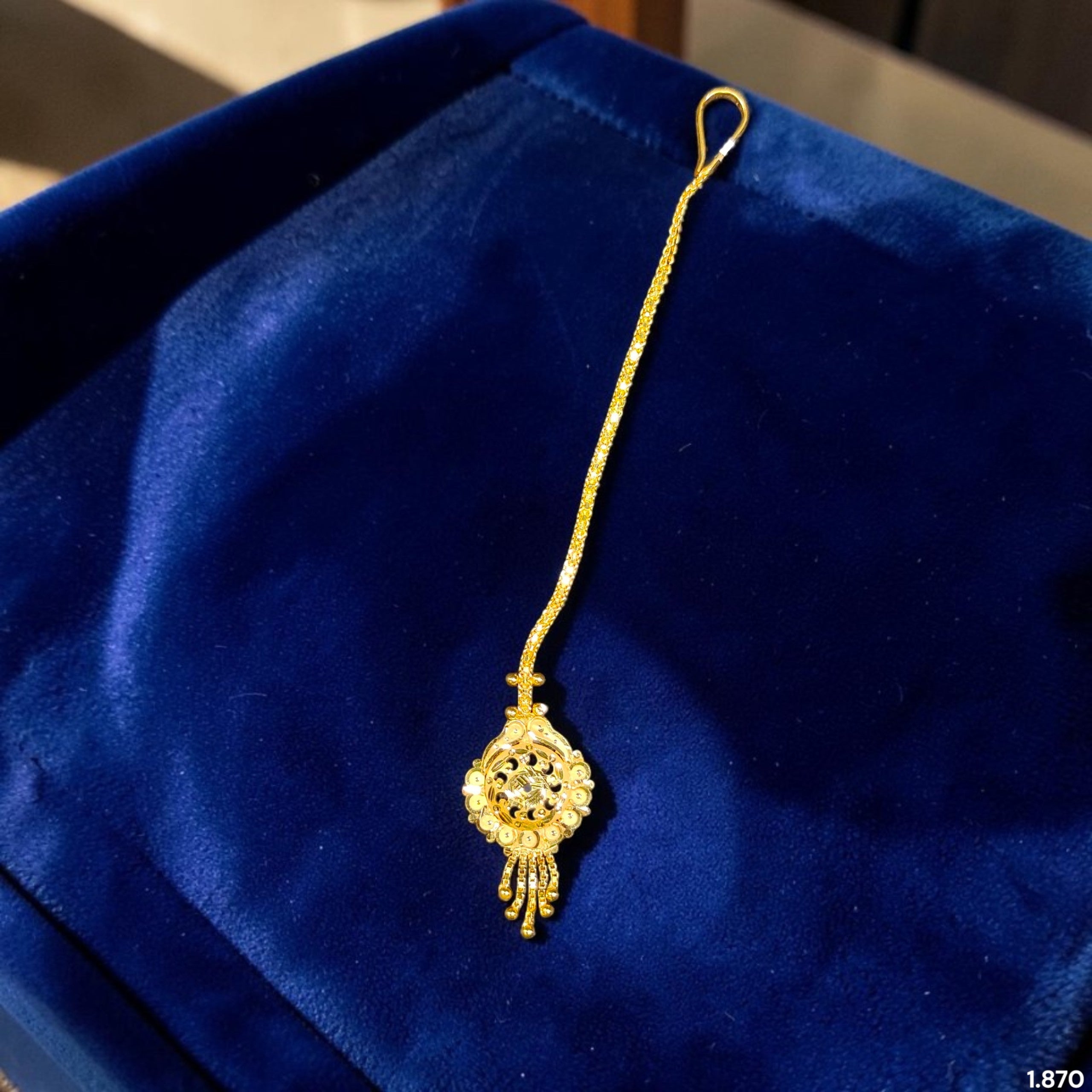 GOLD TICKLY- (WGT: 1.870 GM APPROX) CERTIFIED BIS HUID HALLMARK 375 9KT GOLD TICKLY (MANGTIKA) 1 PIECE FOR MARRIAGE.