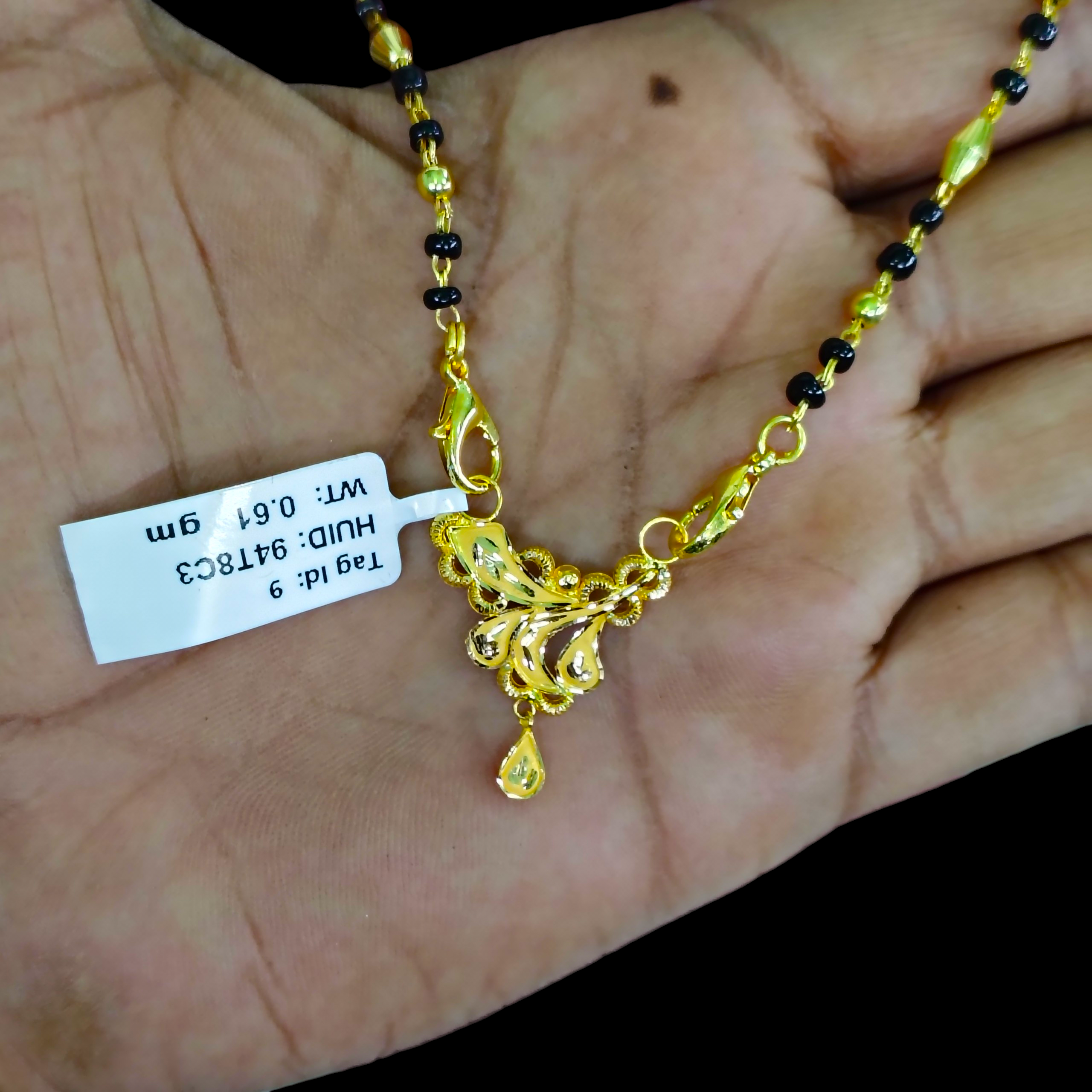 GOLD PENDANT- WGT: 0.610 GM APPROX 22KT HUID HALLMARK GOLD PENDANT MANGALSUTRA 1 PIECE WITH TASSEL.