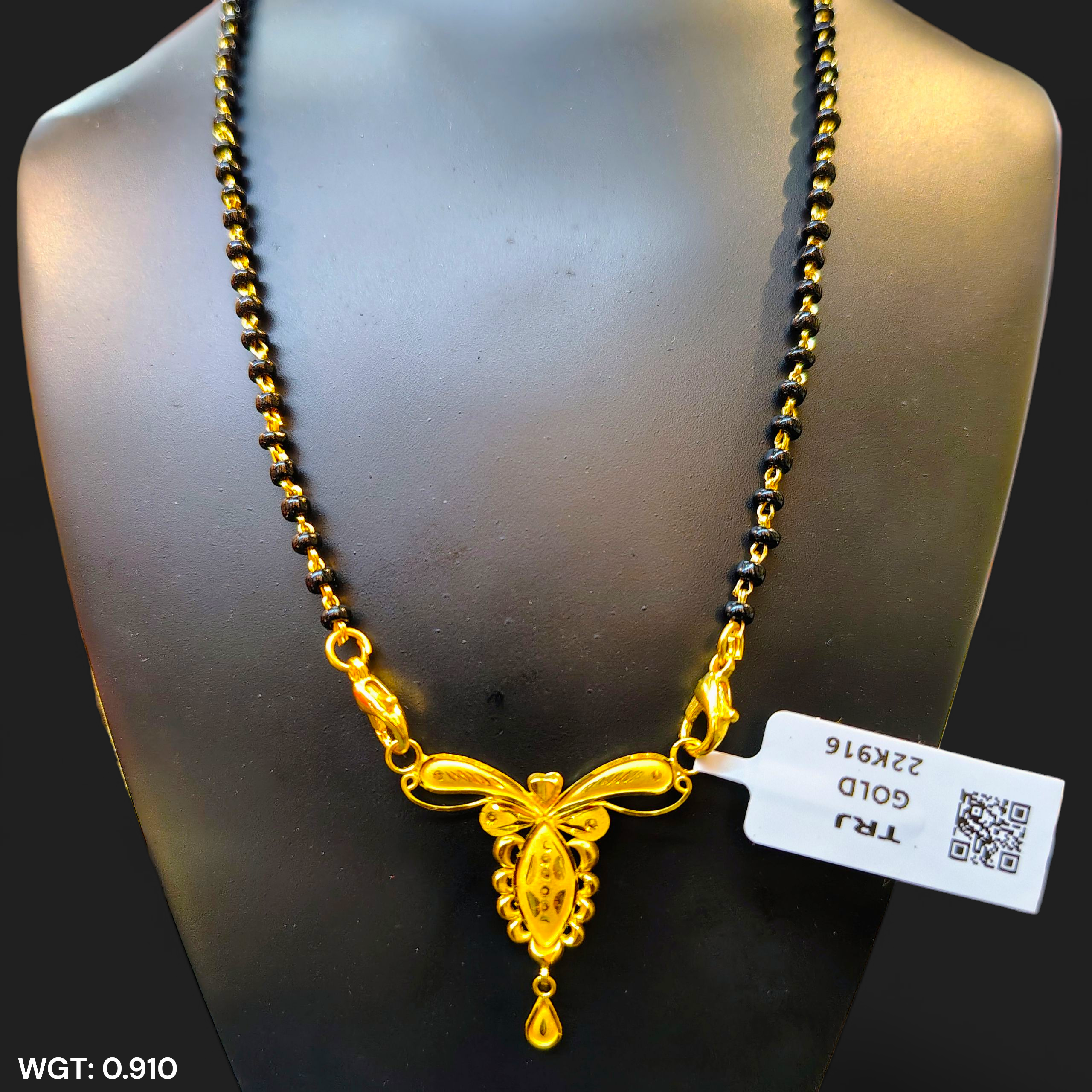 (GPM) TRJ WGT: 0.910 GM APPROX 22KT HUID HALLMARK GOLD PENDANT MANGALSUTRA 1 PIECE WITH TASSEL.