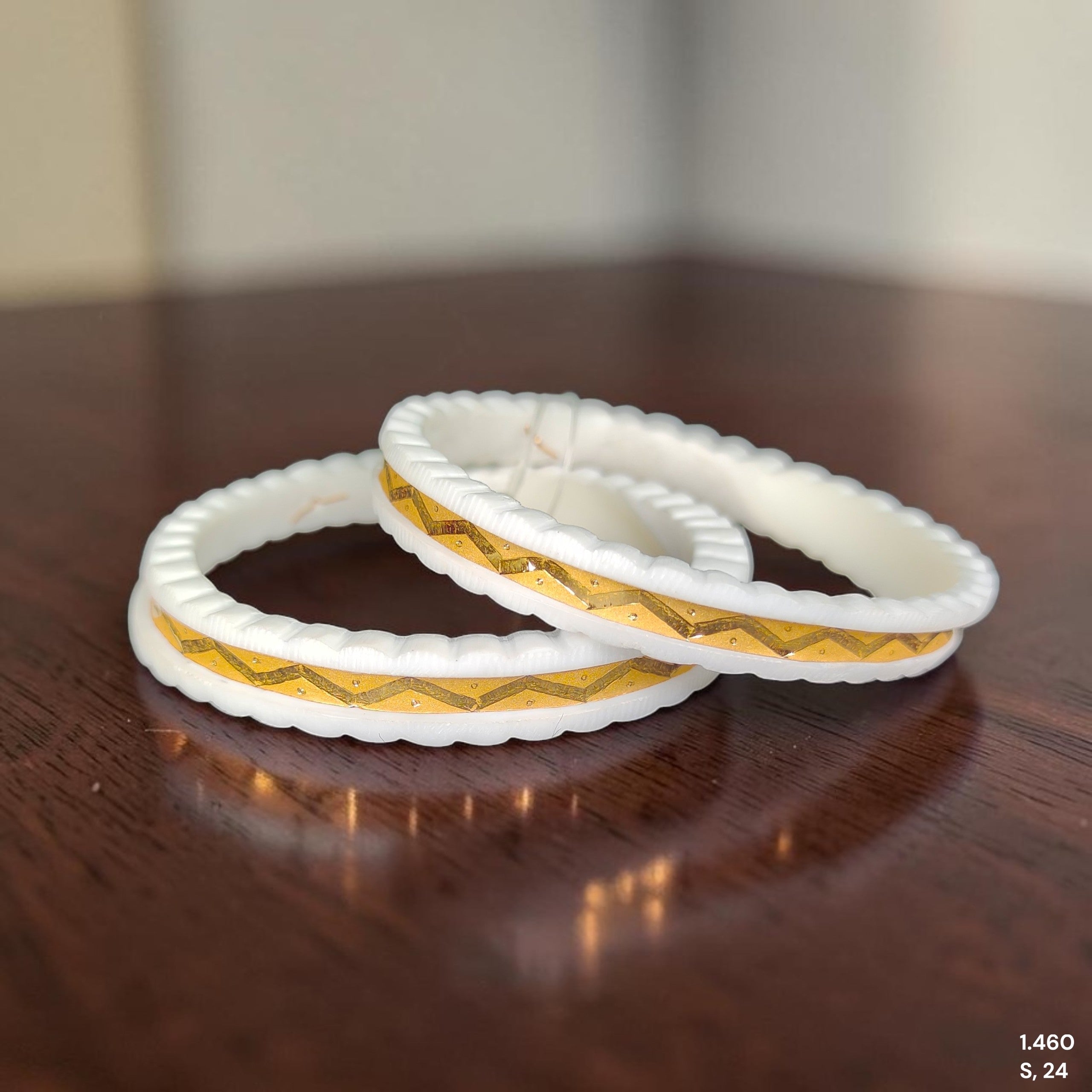 SAKHA BADHANO- (SIZE:24) WGT: 1.460 GM APPROX HUID HALLMARK 22KT GOLD SAKHA BADHANO BANGLES 1 PAIR DESIGN FOR REGULAR USE.