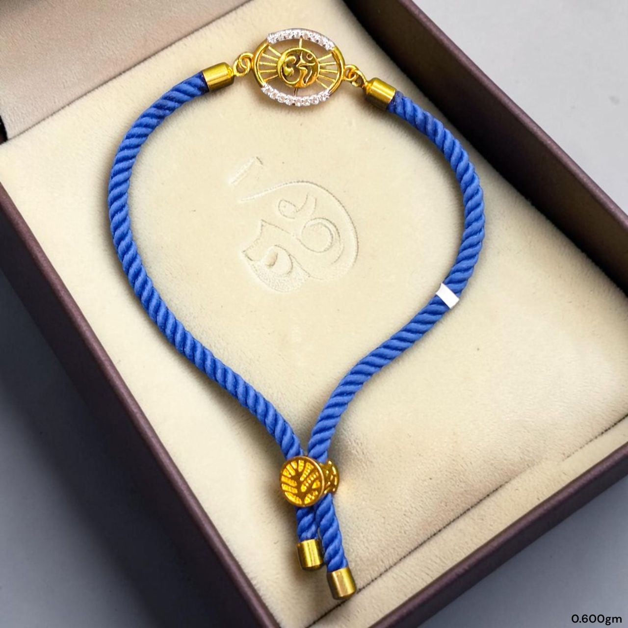 RAKHI- (WGT: 0.600 GM APPROX) BIS CERTIFIED HUID HALLMARK 375 9KT GOLD RAKHI FOR YOUR BELOVED BROTHER (ADJUSTABLE SIZE).
