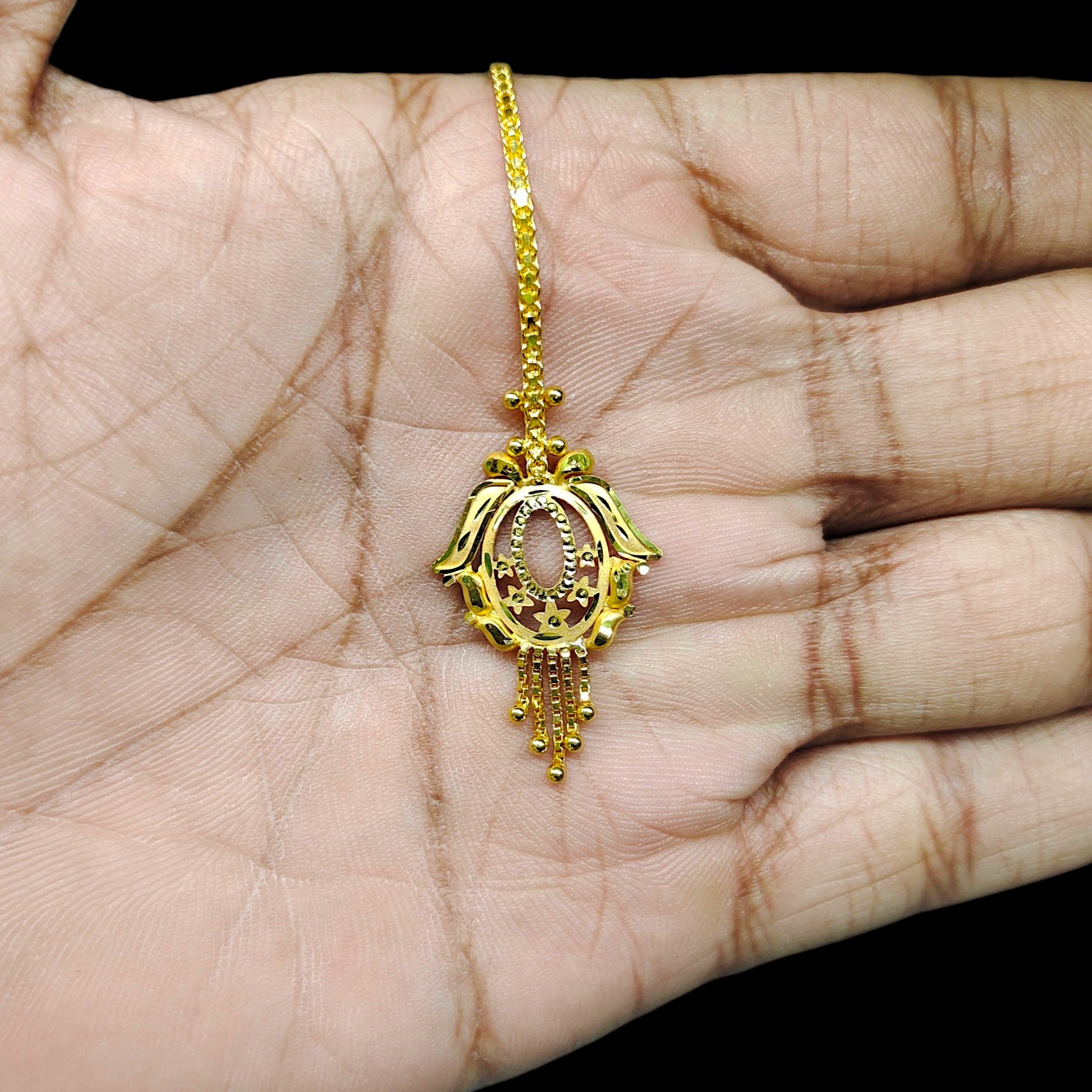 GOLD TICKLY- (WGT: 1.820 GM APPROX) CERTIFIED BIS HUID HALLMARK 375 9KT GOLD TICKLY (MANGTIKA) 1 PIECE FOR MARRIAGE.