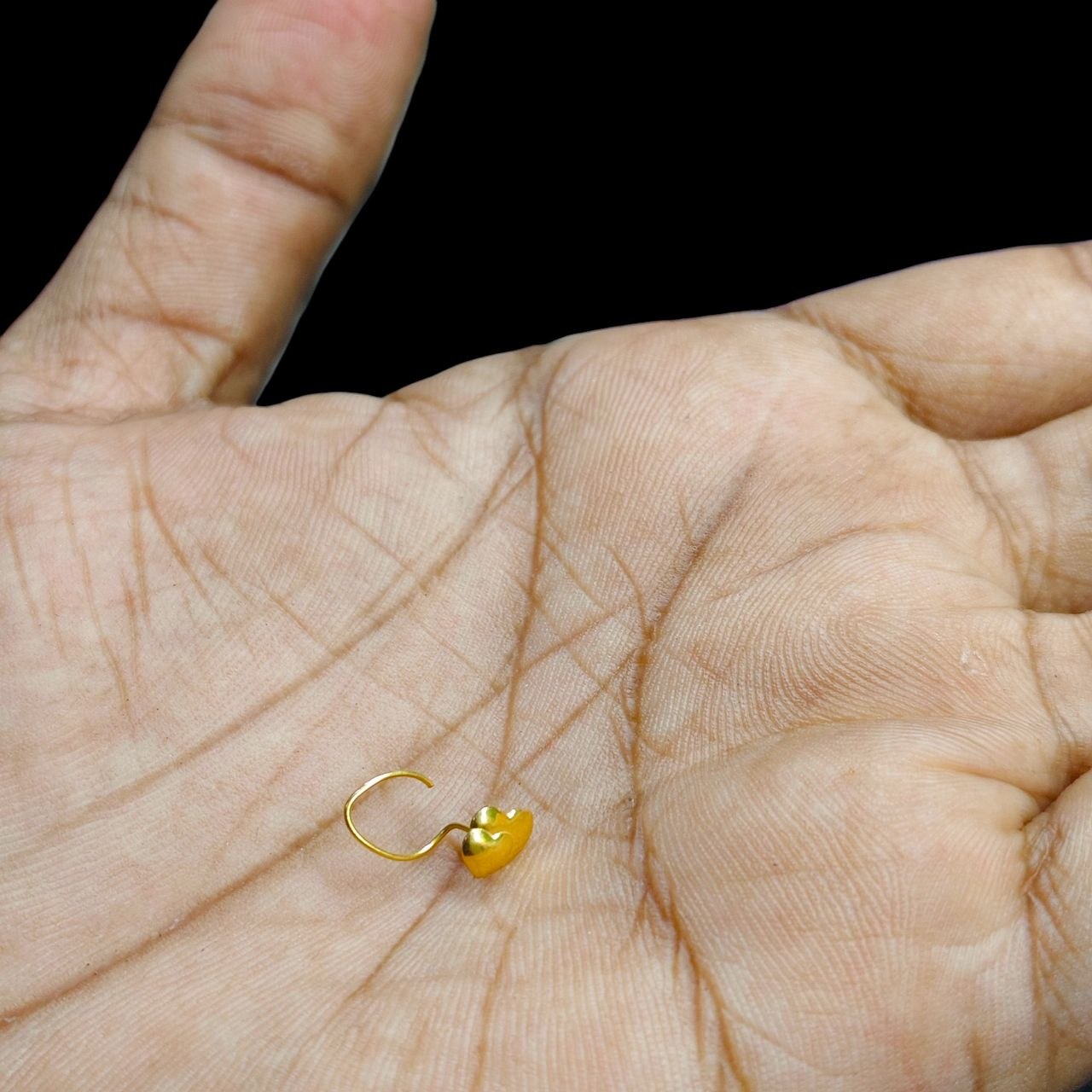 GOLD NOSEPIN- BIS CERTIFIED HUID HALLMARK 375 9KT GOLD NOSEPIN 1 PIECE FOR WOMEN (FOR REGULAR USE). SOLD ON MRP.