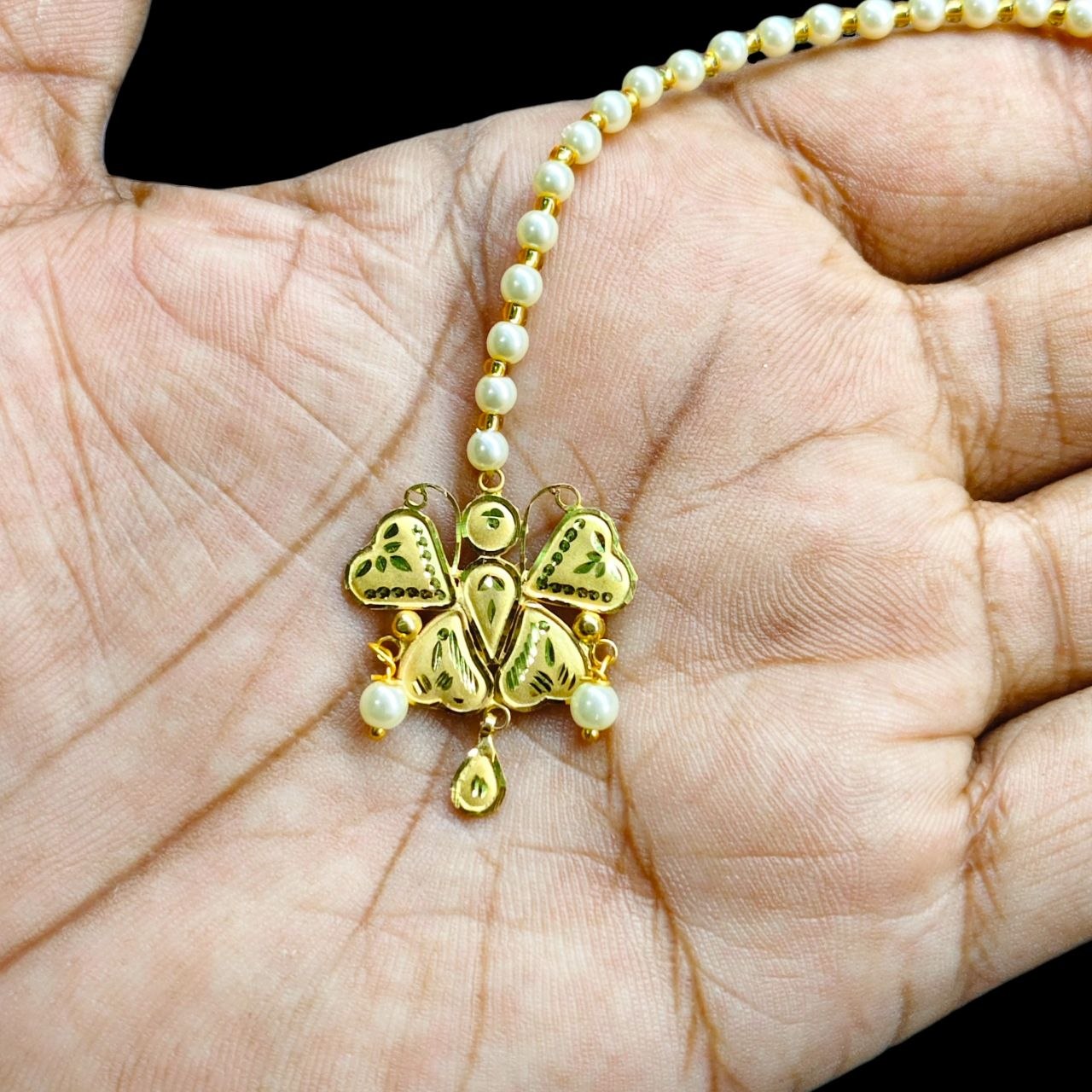 GOLD TICKLY- (WGT: 0.710 GM APPROX) CERTIFIED BIS HUID HALLMARK 375 9KT GOLD TICKLY (MANGTIKA) 1 PIECE FOR MARRIAGE.