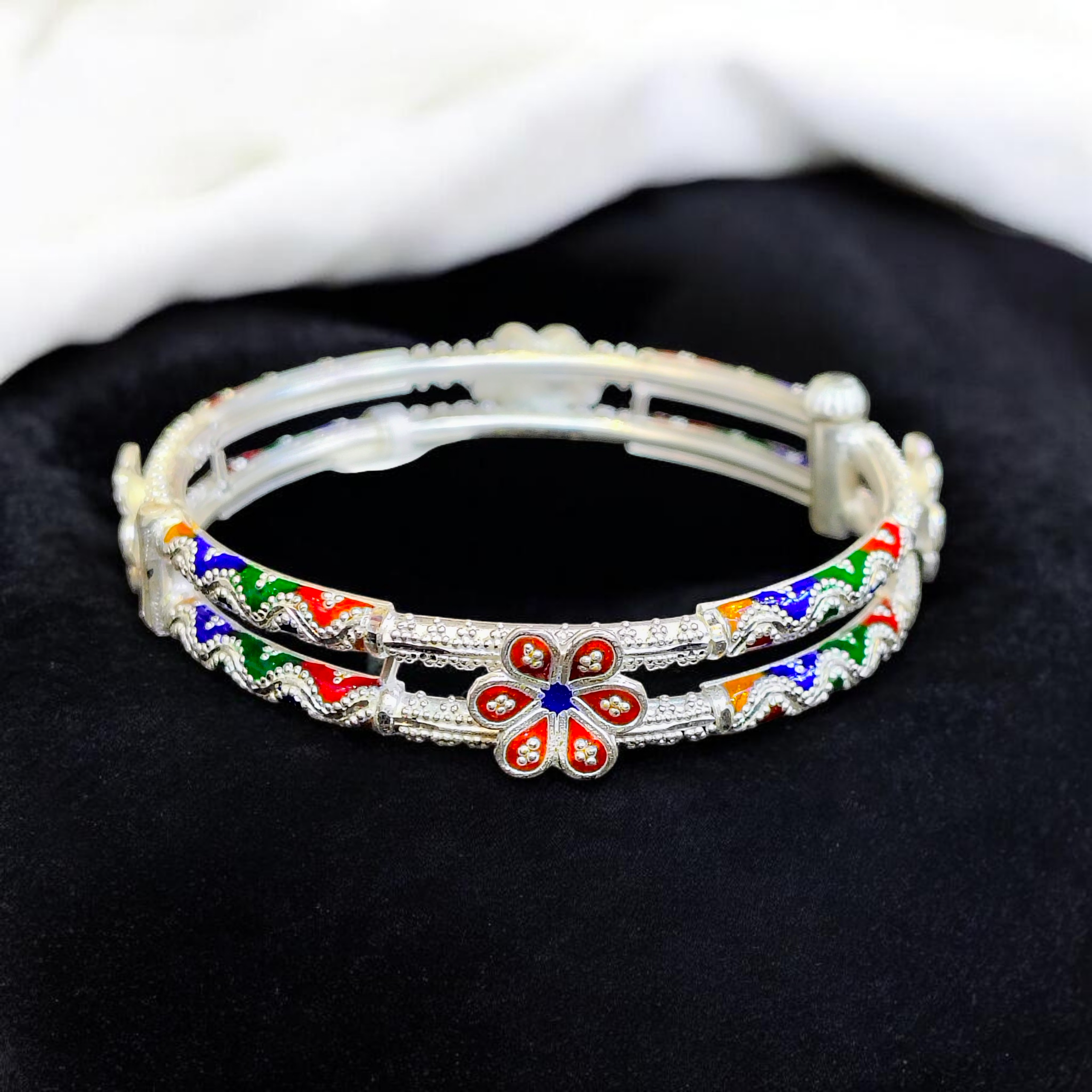 LUXURY SILVER BANGLE- (SIZE 26 KHILEN) CERTIFIED BIS HALLMARK 925 SILVER BANGLE (MANIPUR DESIGN) APPROX WGT: 24.350 GM (1 PIECE) FOR REGULAR USE FOR WOMEN.