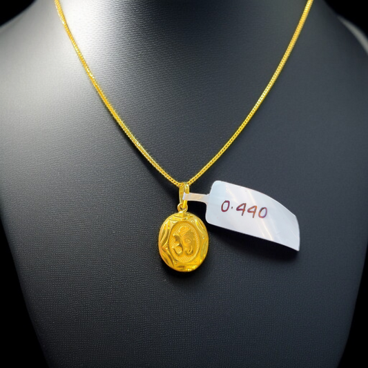 TRJ WGT: 0.440 GM APPROX KDM GOLD LOCKET 1 PIECE (50 TONCH) WITH ADJUSTABLE TASSEL.