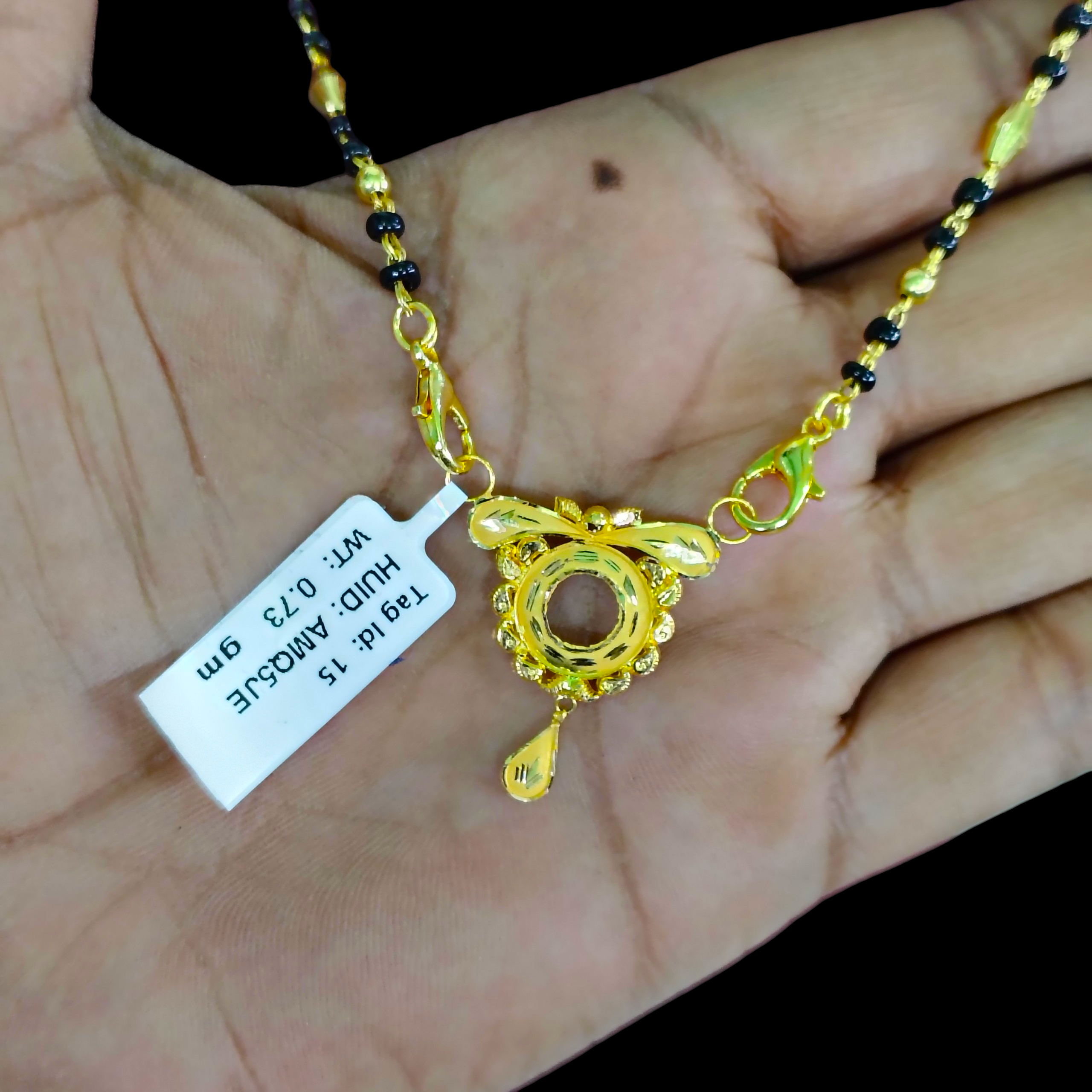 GOLD PENDANT- WGT: 0.730 GM APPROX 22KT HUID HALLMARK GOLD PENDANT MANGALSUTRA 1 PIECE WITH TASSEL.