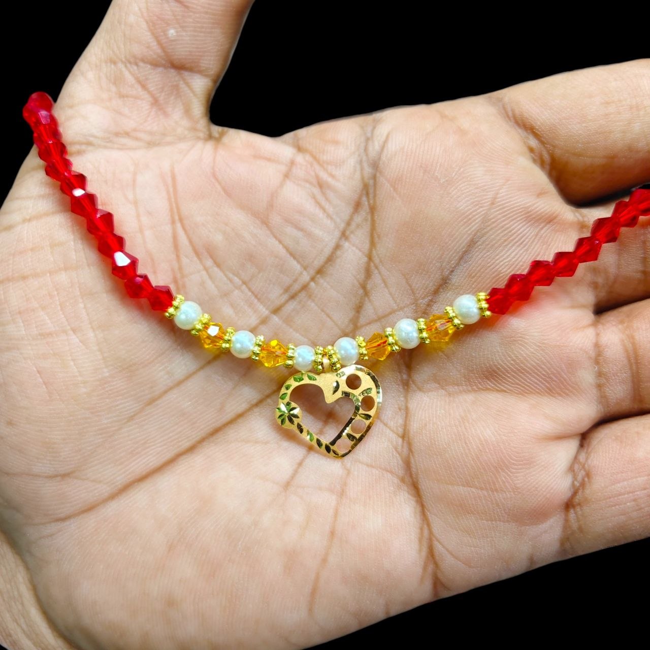GOLD LOCKET- WGT: 0.240 GM APPROX BIS CERTIFIED HUID HALLMARK 22KT GOLD MOTI LOCKET 1 PIECE FOR WOMEN (WITH PUTI CHAIN).
