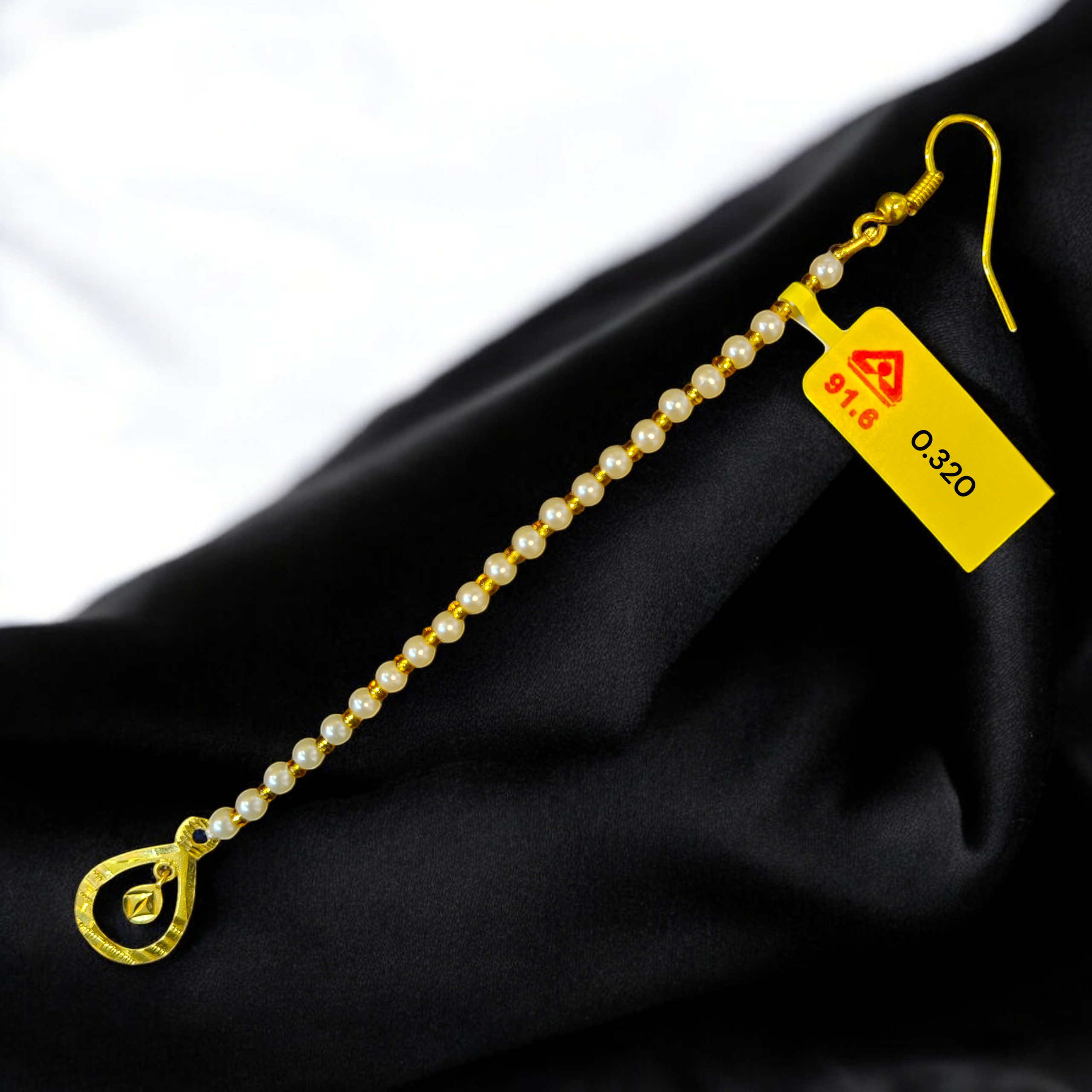 (GTMT) TRJ WGT: 0.320 GM APPROX 18KT HUID HALLMARK GOLD TICKLY (MANGTIKA) 1 PIECE FOR MARRIAGE.