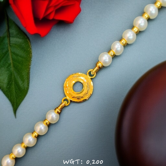RAJLAXMI WGT: 0.200 GM APPROX HUID HALLMARK 916 22KT GOLD WRISTLET WITH PEARL CHAIN FOR BABY.