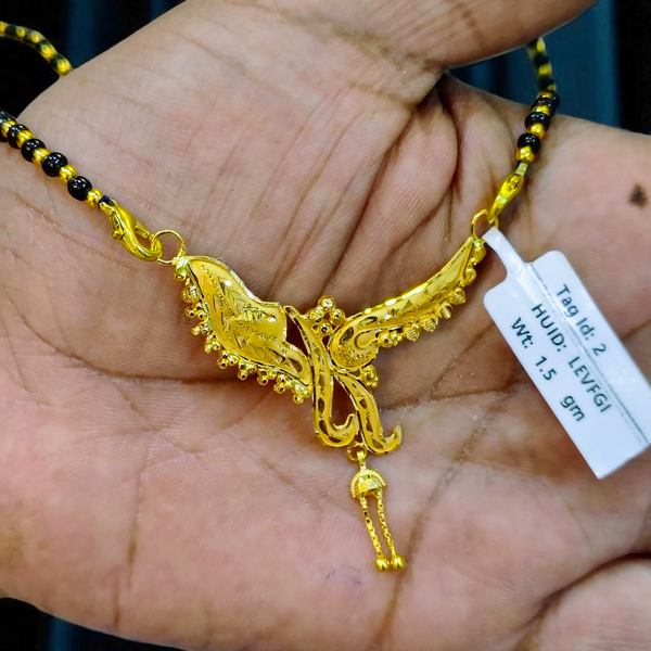 TRJ WGT: 1.500 GM APPROX 22KT HUID HALLMARK GOLD PENDANT MANGALSUTRA 1 PIECE WITH TASSEL.