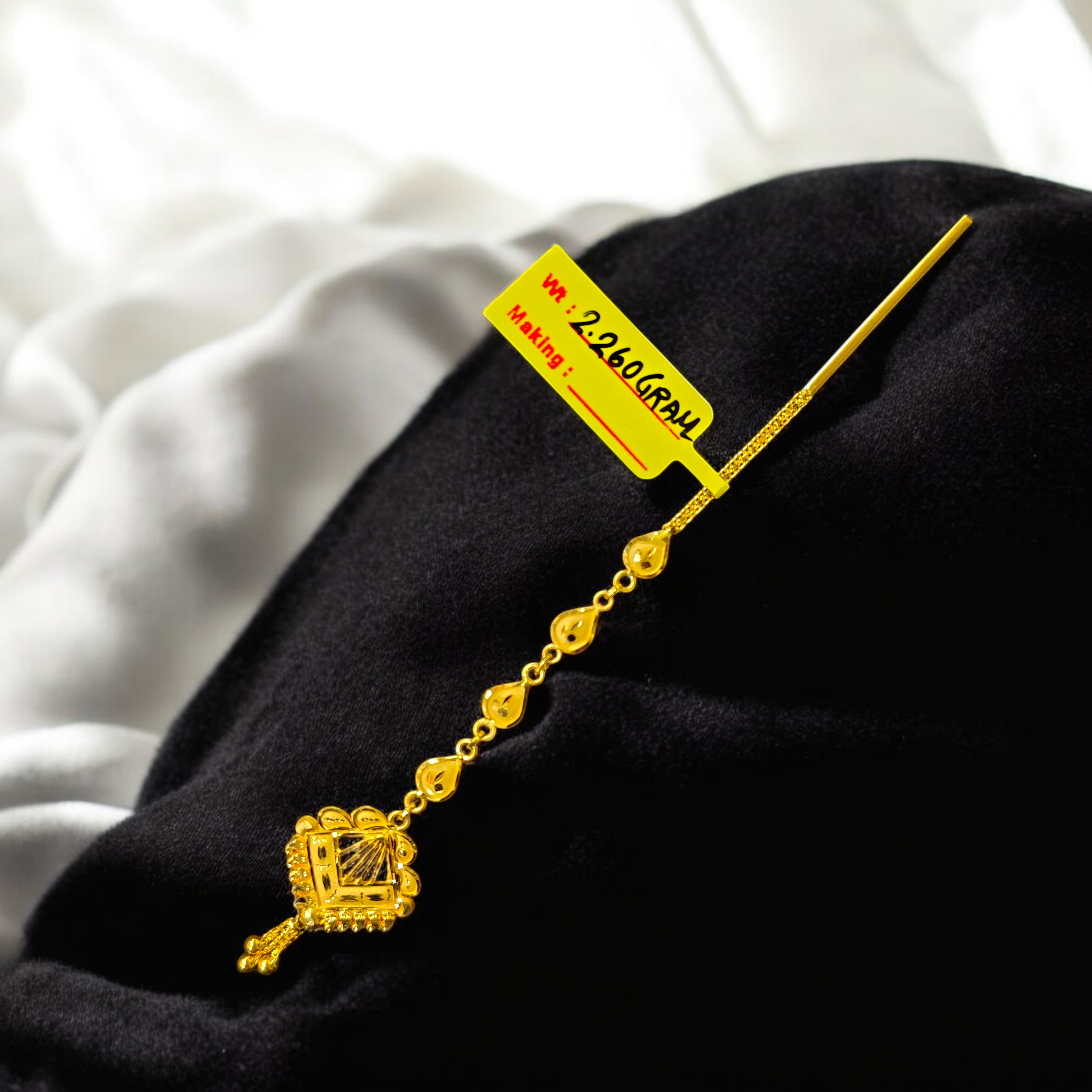 GOLD TICKLY- BIS CERTIFIED HUID HALLMARK 916 22KT GOLD TICKLY (MANGTIKA) WGT: 2.260 APPROX 1 PIECE FOR WOMEN FOR MARRIAGE.