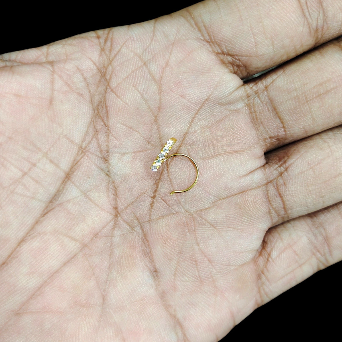 GOLD NOSEPIN- (WGT: 0.180 GM APPROX) BIS CERTIFIED HUID HALLMARK 375 9KT GOLD NOSEPIN 1 PIECE FOR WOMEN (FOR REGULAR USE). SOLD ON MRP.