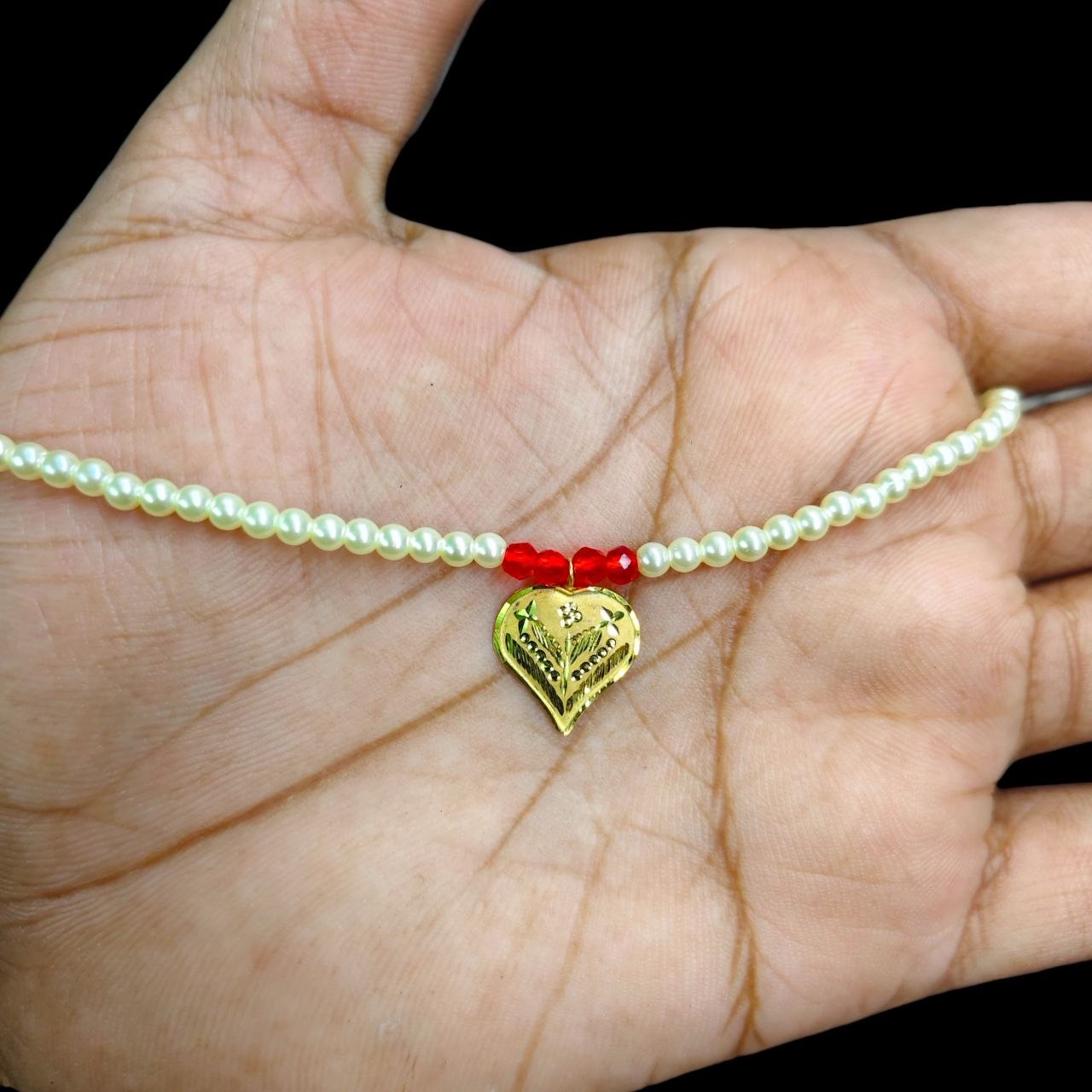 GOLD LOCKET- (WGT: 0.230 GM APPROX) BIS CERTIFIED HUID HALLMARK 9KT GOLD LOCKET 1 PIECE FOR WOMEN (WITH MOTI CHAIN).