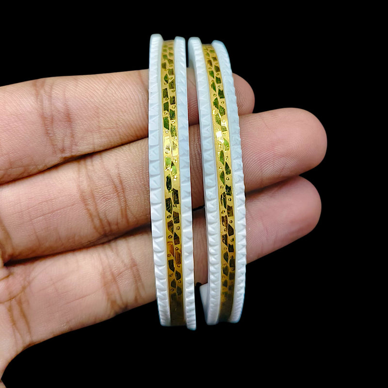 GSB9K- (ISYBYH)-(DPJQDV) (SIZE:27) (WGT: 1.110 GM APPROX) BIS CERTIFIED HUID HALLMARK 375 9KT GOLD SAKHA BADHANO 1 PAIR FOR WOMEN (CHILA PATH DESIGN) NOT FOR REGULAR USE.