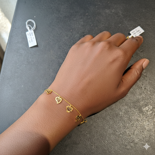 GOLD WRISTLET- BIS CERTIFIED HUID HALLMARK 375 9KT GOLD WRISTLET APPROX WGT: 1.110 FOR WOMEN.