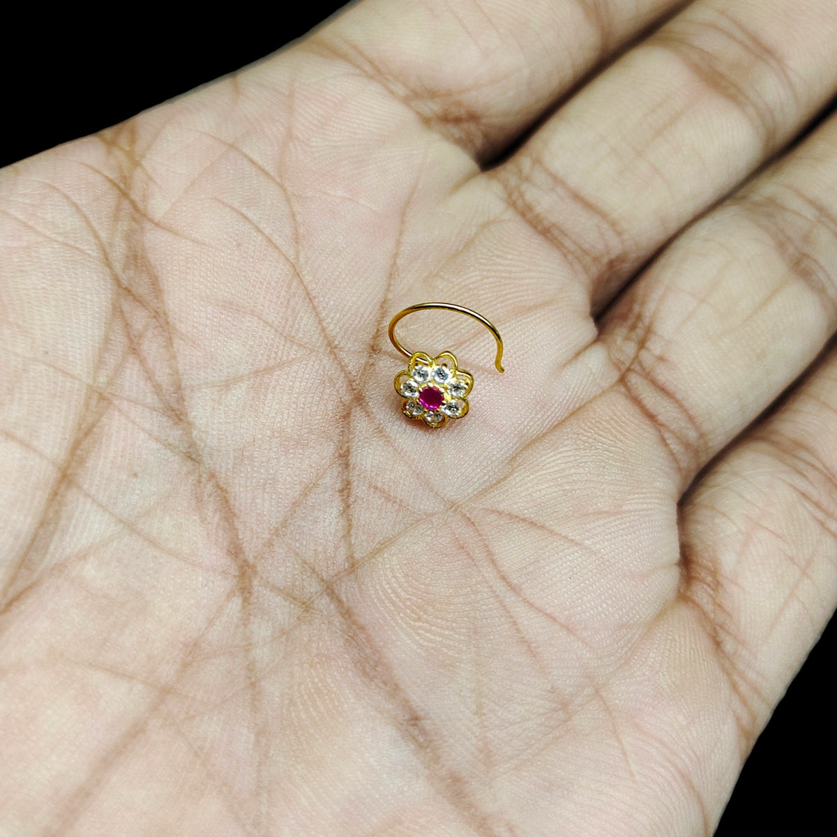 GOLD NOSEPIN- (WGT: 0.300 GM APPROX) BIS CERTIFIED HUID HALLMARK 375 9KT GOLD NOSEPIN 1 PIECE FOR WOMEN (FOR REGULAR USE). SOLD ON MRP.