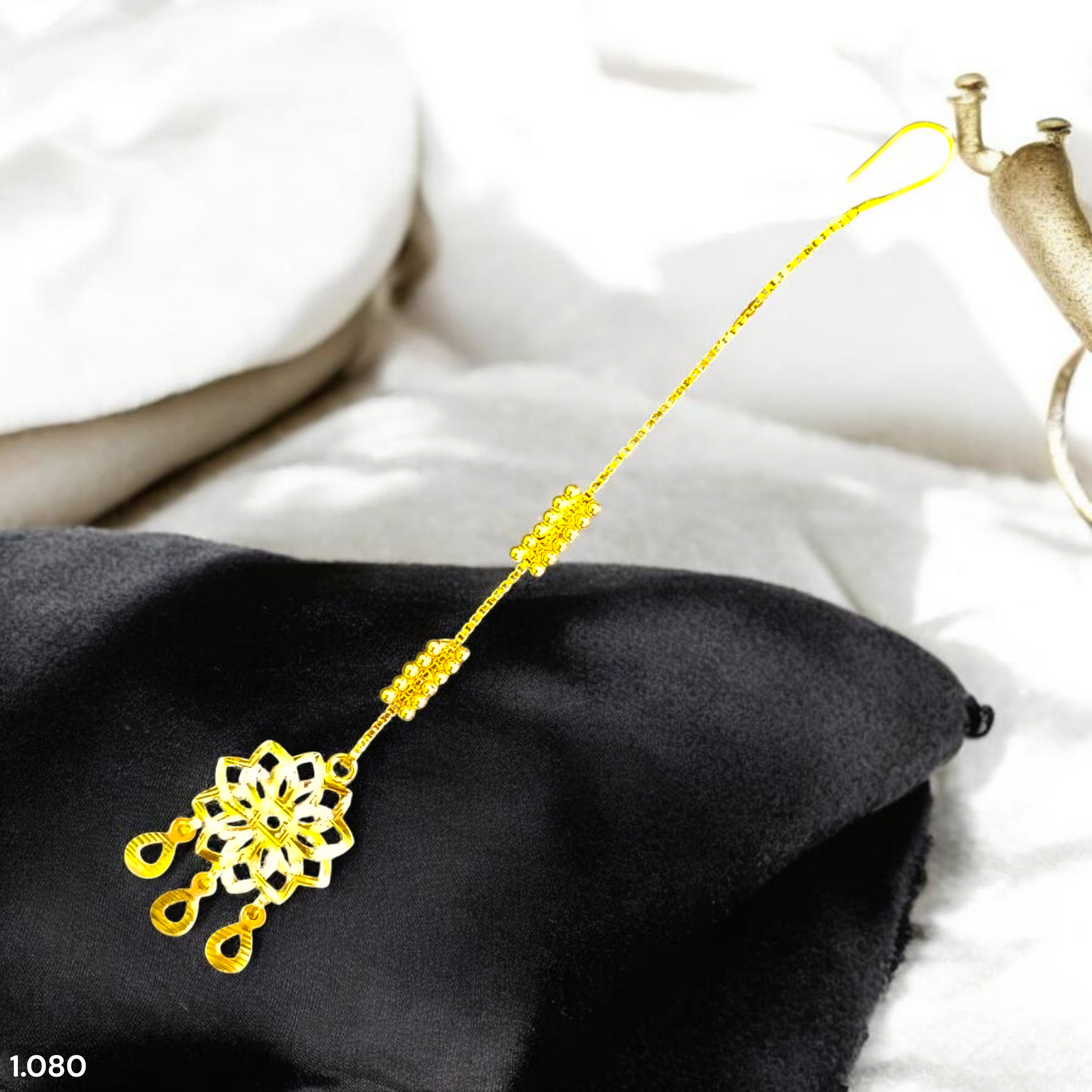 GOLD TICKLY- BIS CERTIFIED WGT: 1.080 GM APPROX HUID HALLMARK 375 9KT GOLD TICKLY (MANGTIKA) 1 PIECE FOR MARRIAGE.