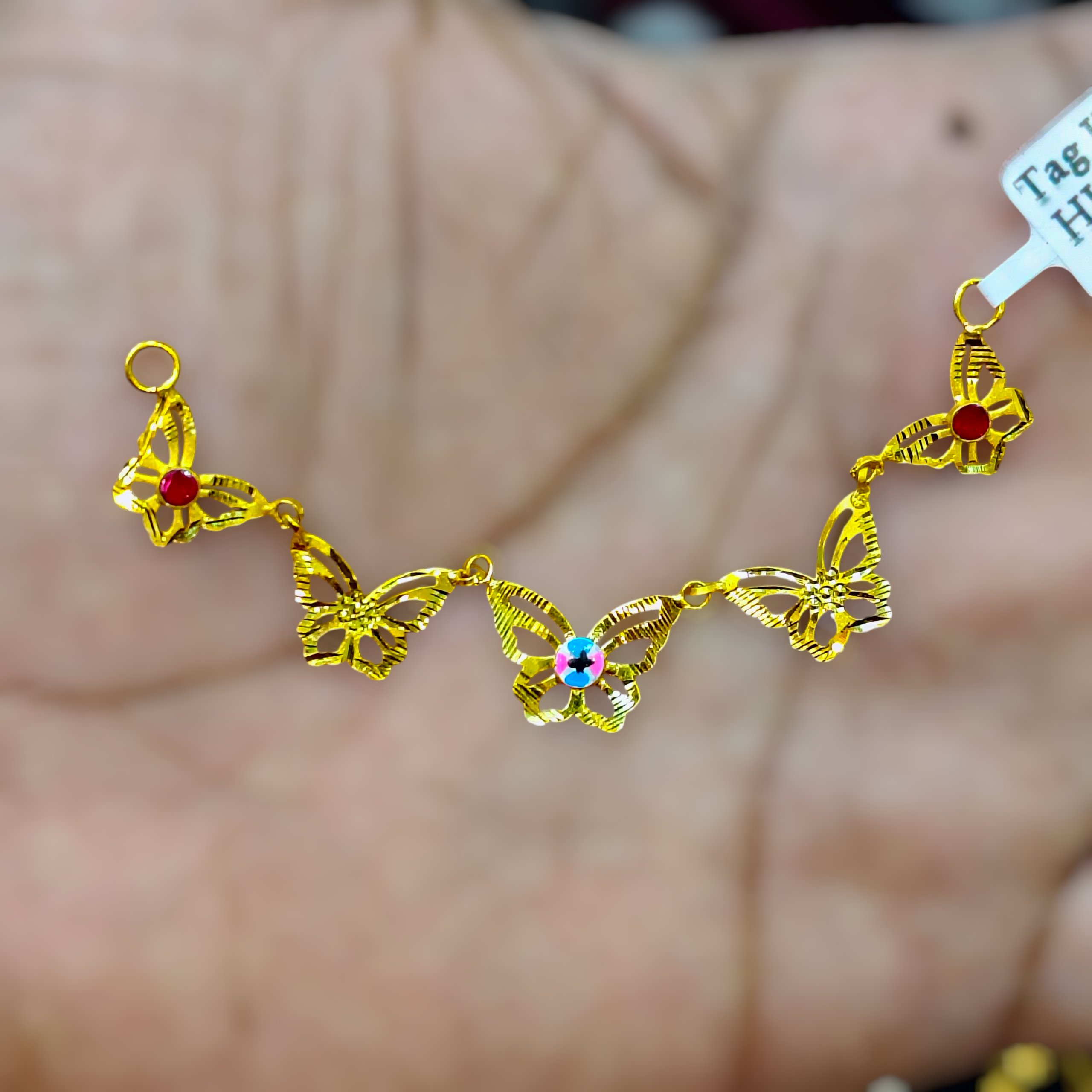 (GPM) TRJ WGT: 1.240 GM APPROX 22KT HUID HALLMARK GOLD PENDANT 1 PIECE WITH ADJUSTABLE TASSEL.